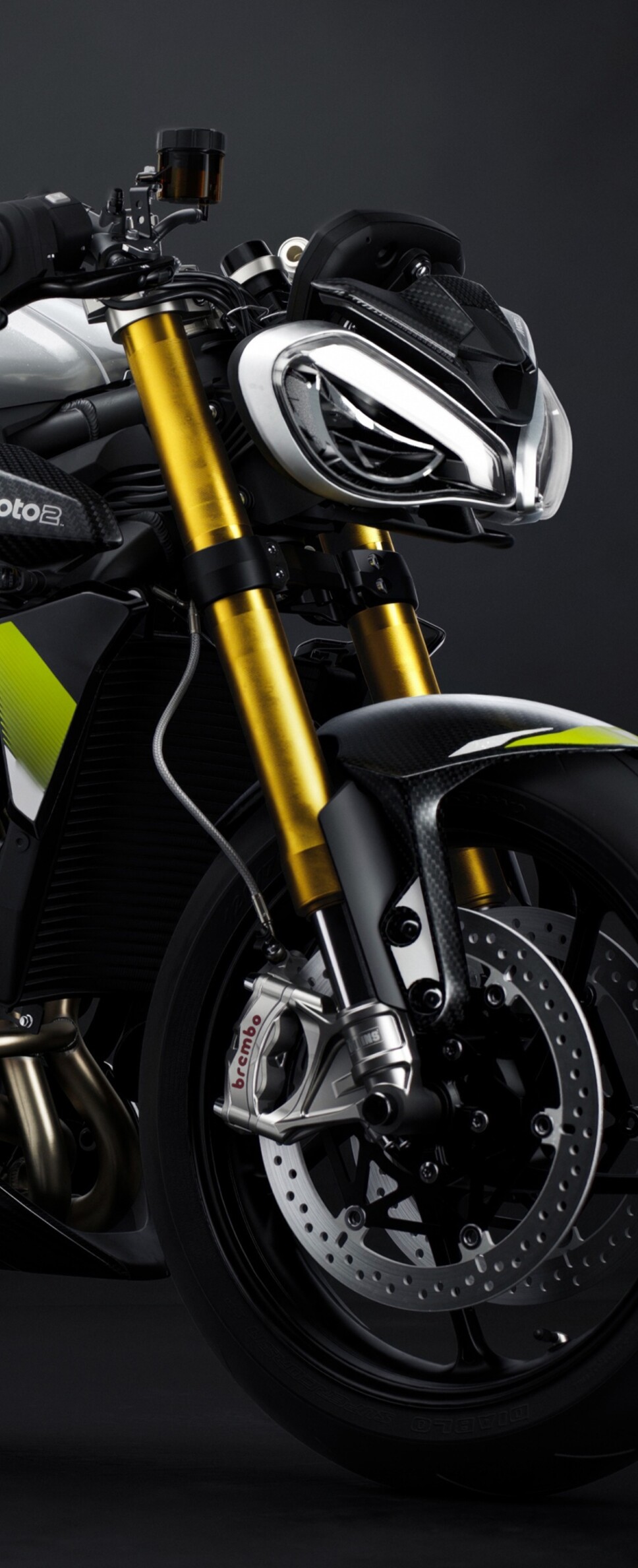 Triumph Street Triple 765 Moto2 Edition motorcycle against a moody dark background