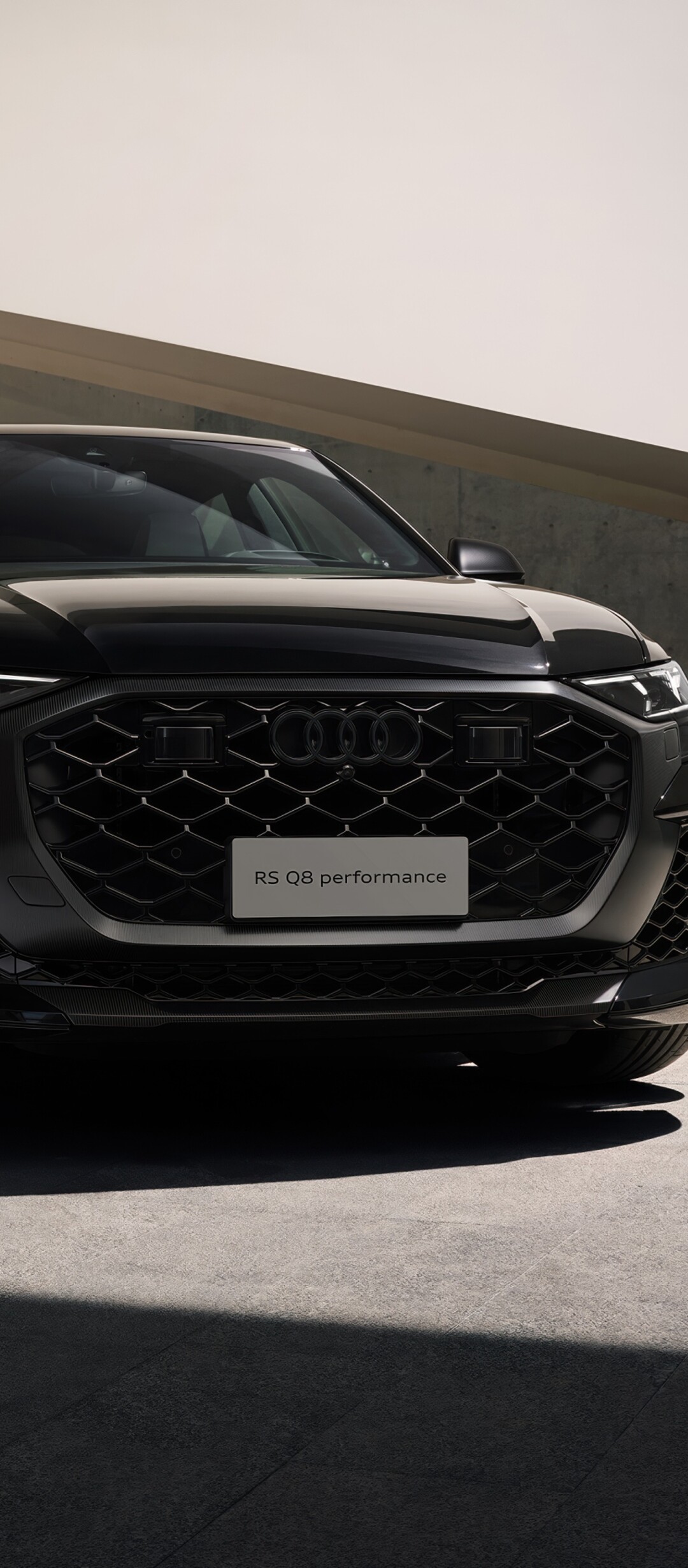 A sleek black Audi RS Q8 luxury performance SUV presented in a high-quality, cinematic style.