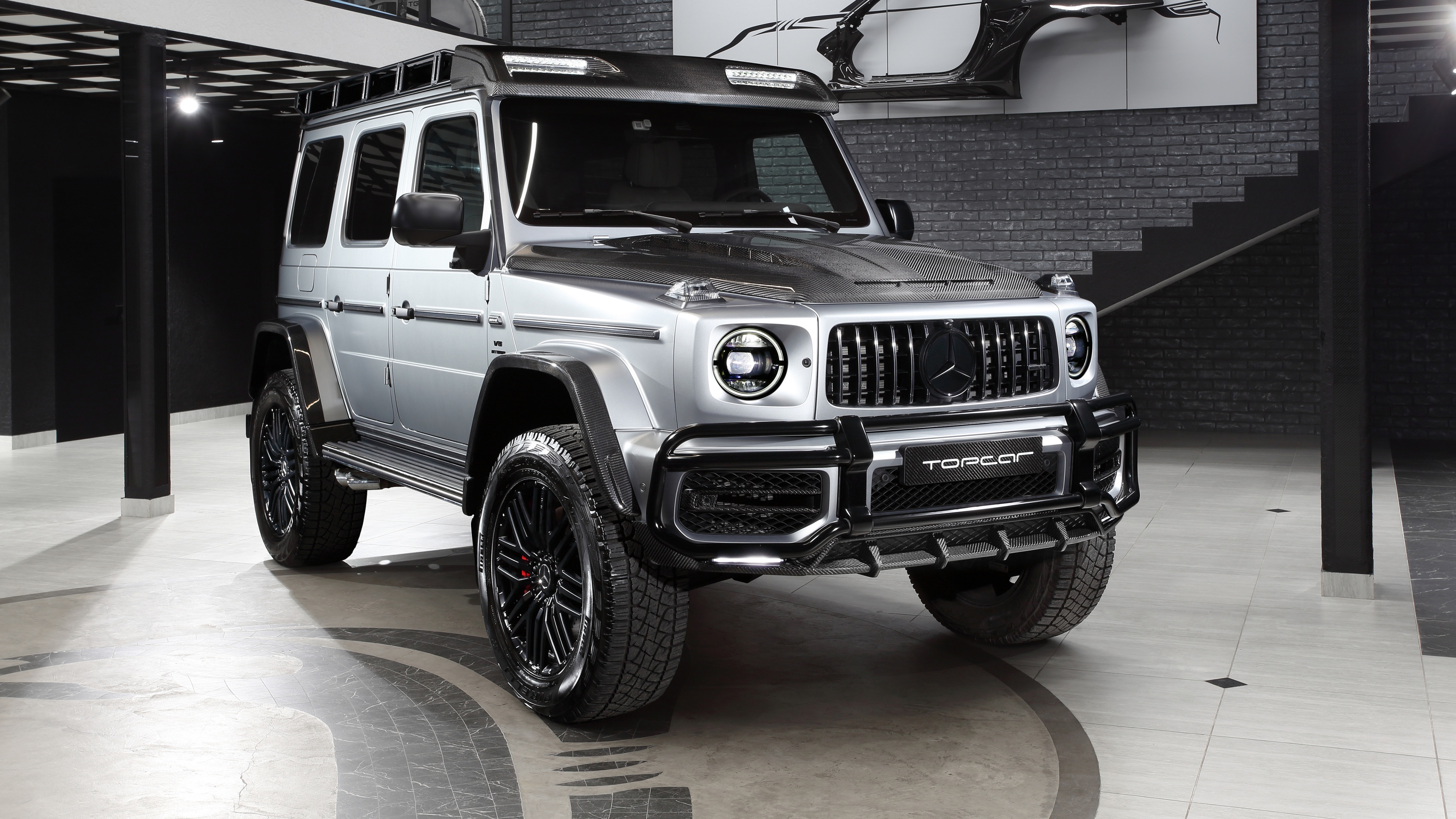 A high-end Mercedes-AMG G 63 SUV featuring a sleek and aggressive design.