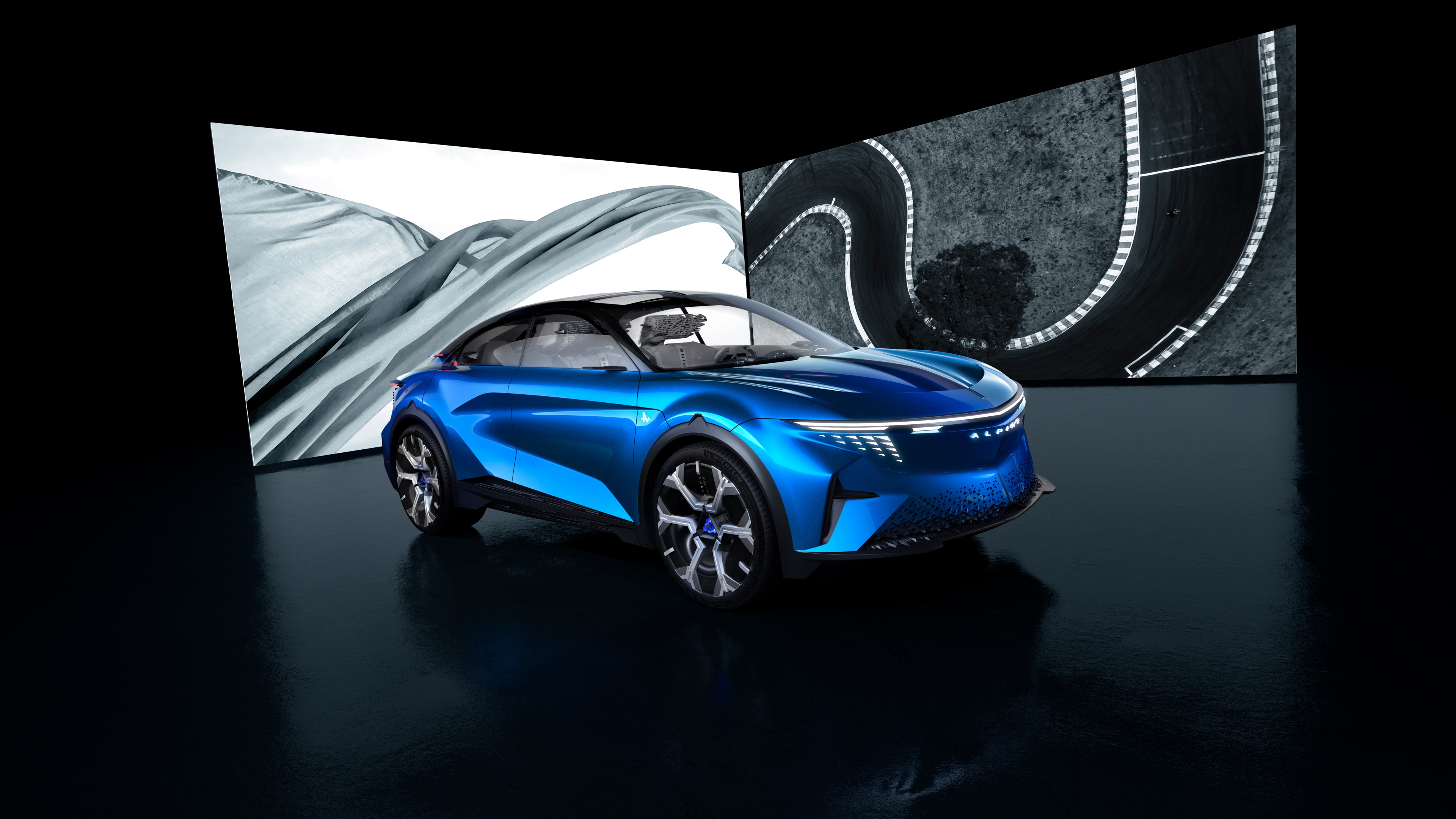 A high-resolution, sleek 2024 Fastback electric crossover vehicle set against a dark, moody background.