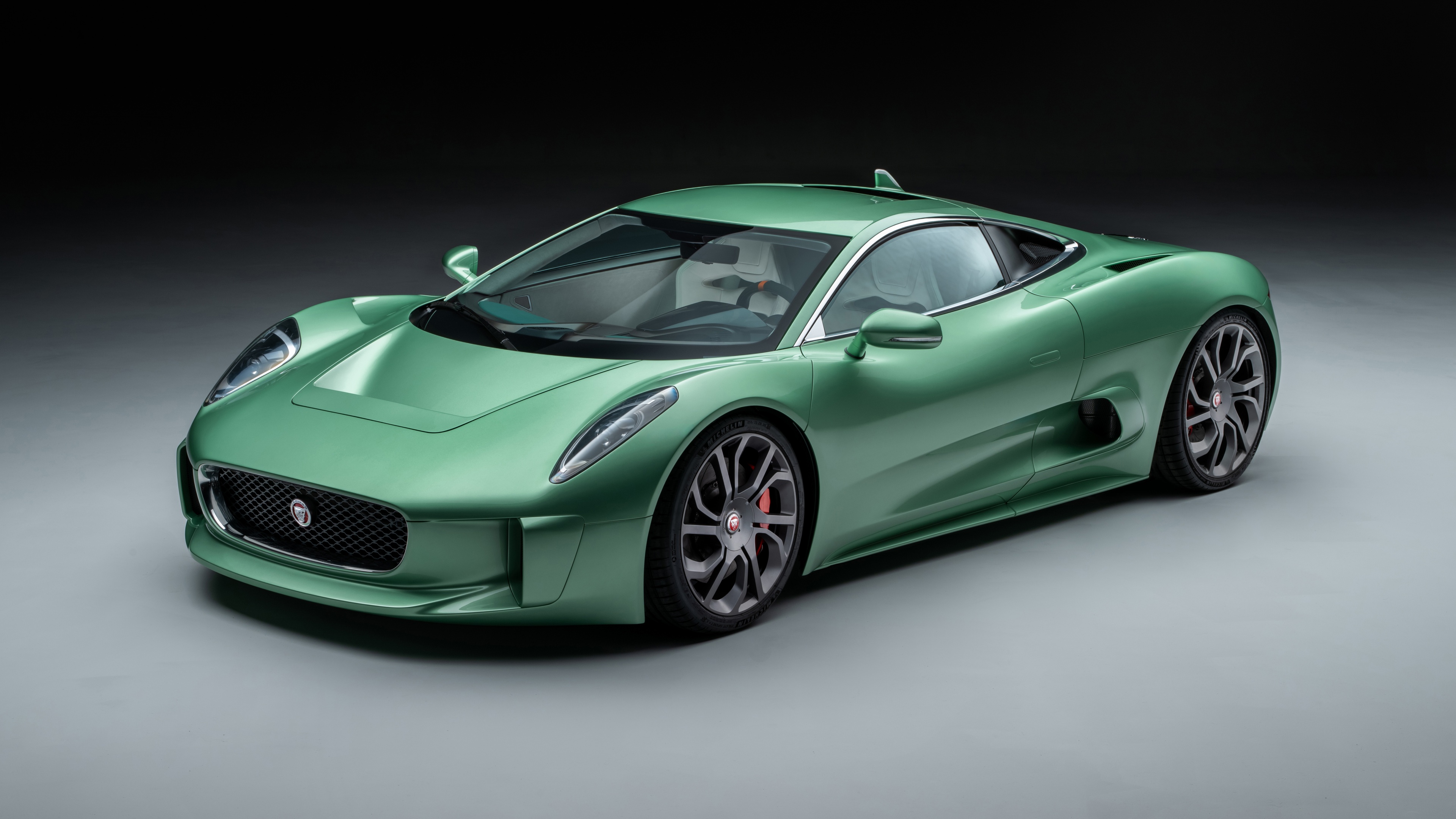 A lineup of ultra-modern 2024 supercars with sleek aerodynamic designs and high-gloss finishes in ultra-high definition.