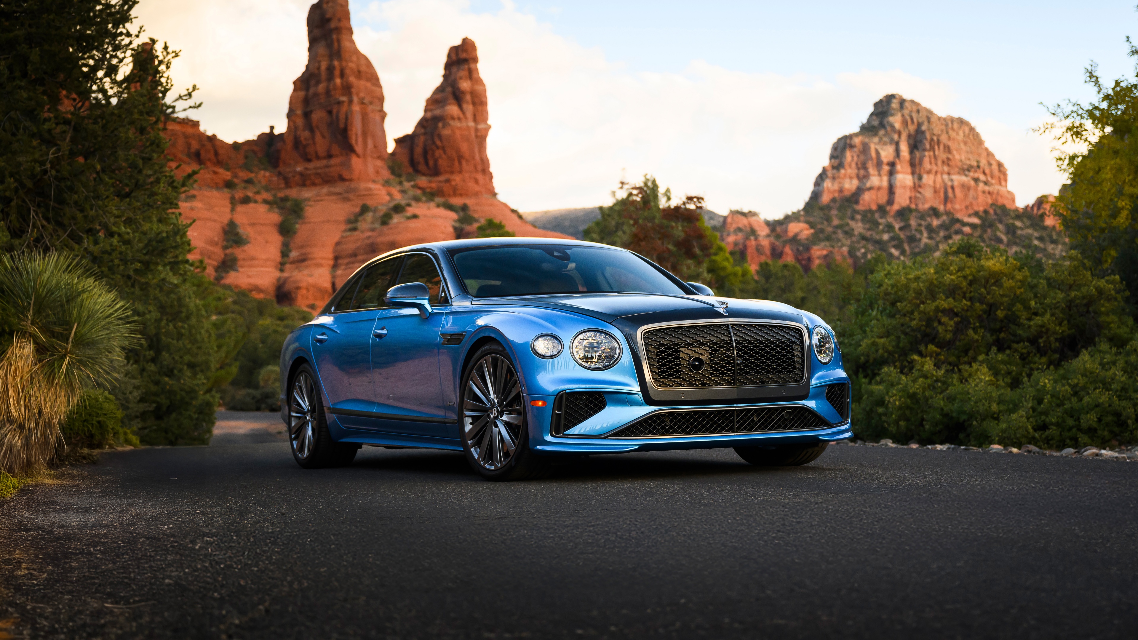 A high-resolution 8K shot of a 2025 Bentley Flying Spur Speed luxury sedan parked outdoors.