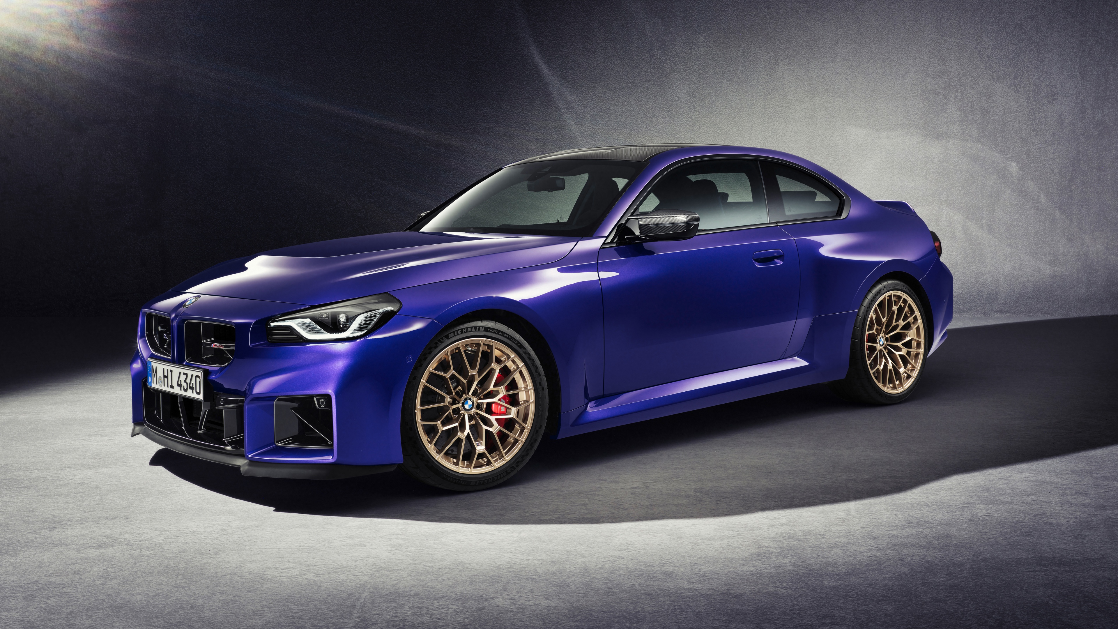 A high-detail, 5K resolution shot of the 2025 BMW M2 CS performance car featuring sleek metallic bodywork and an aggressive stance.