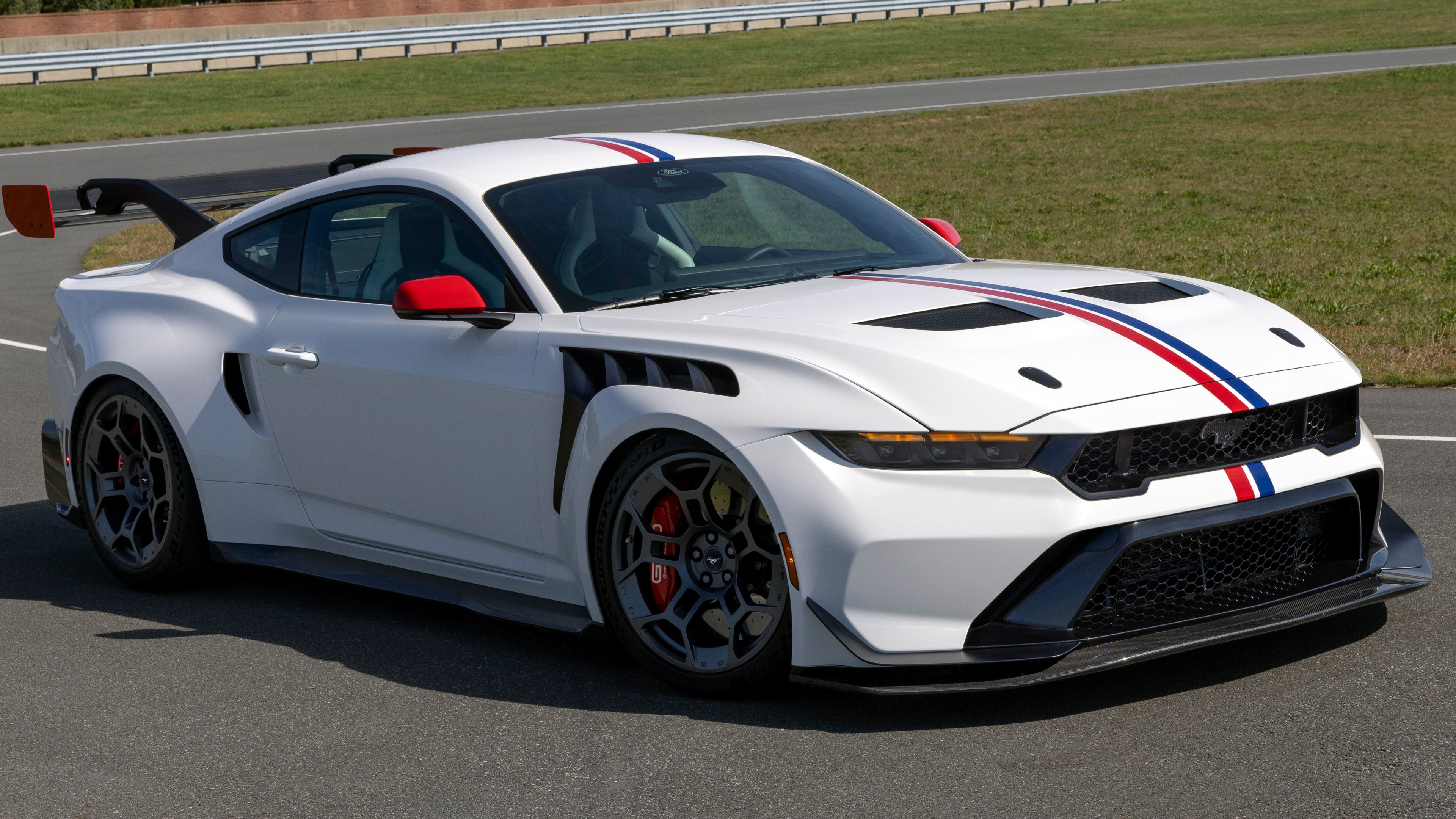 Cinematic wide shot of the 2025 Ford Mustang GTD high-performance sports car