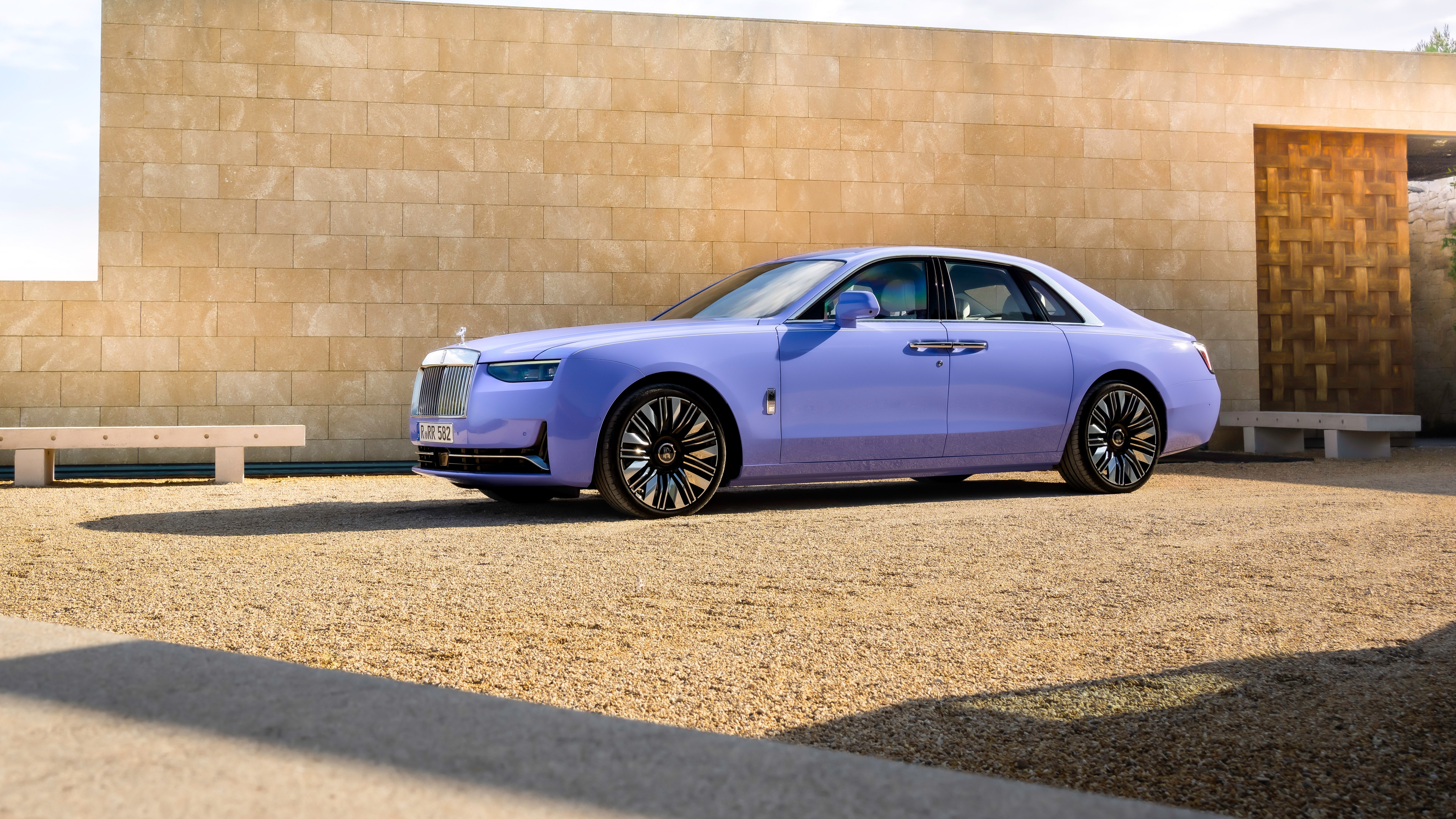 A high-resolution, close-up shot of the 2025 Rolls-Royce Ghost luxury automobile.