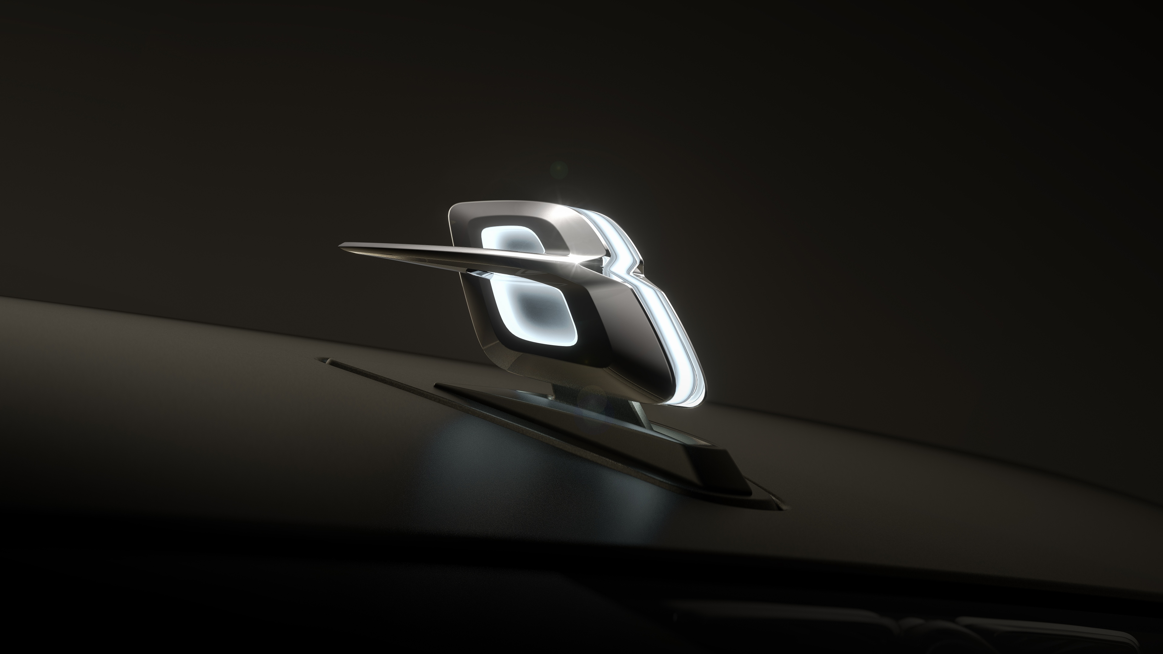 A high-detail close-up of the Bentley EXP 15 logo on a dark, minimalist background.