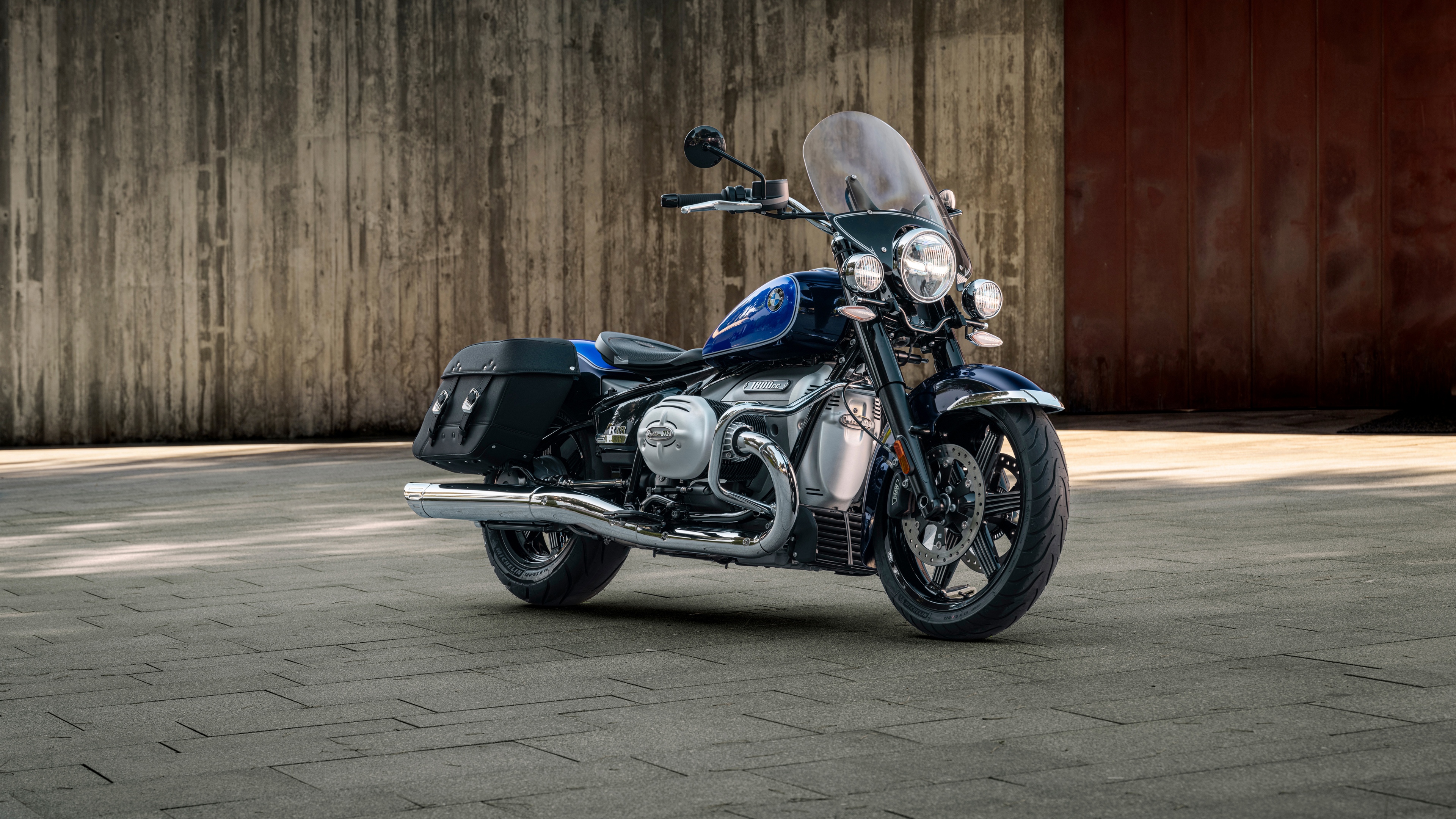 High-resolution close-up of the 2025 BMW R 18 Classic cruiser motorcycle with chrome detailing and classic design elements.