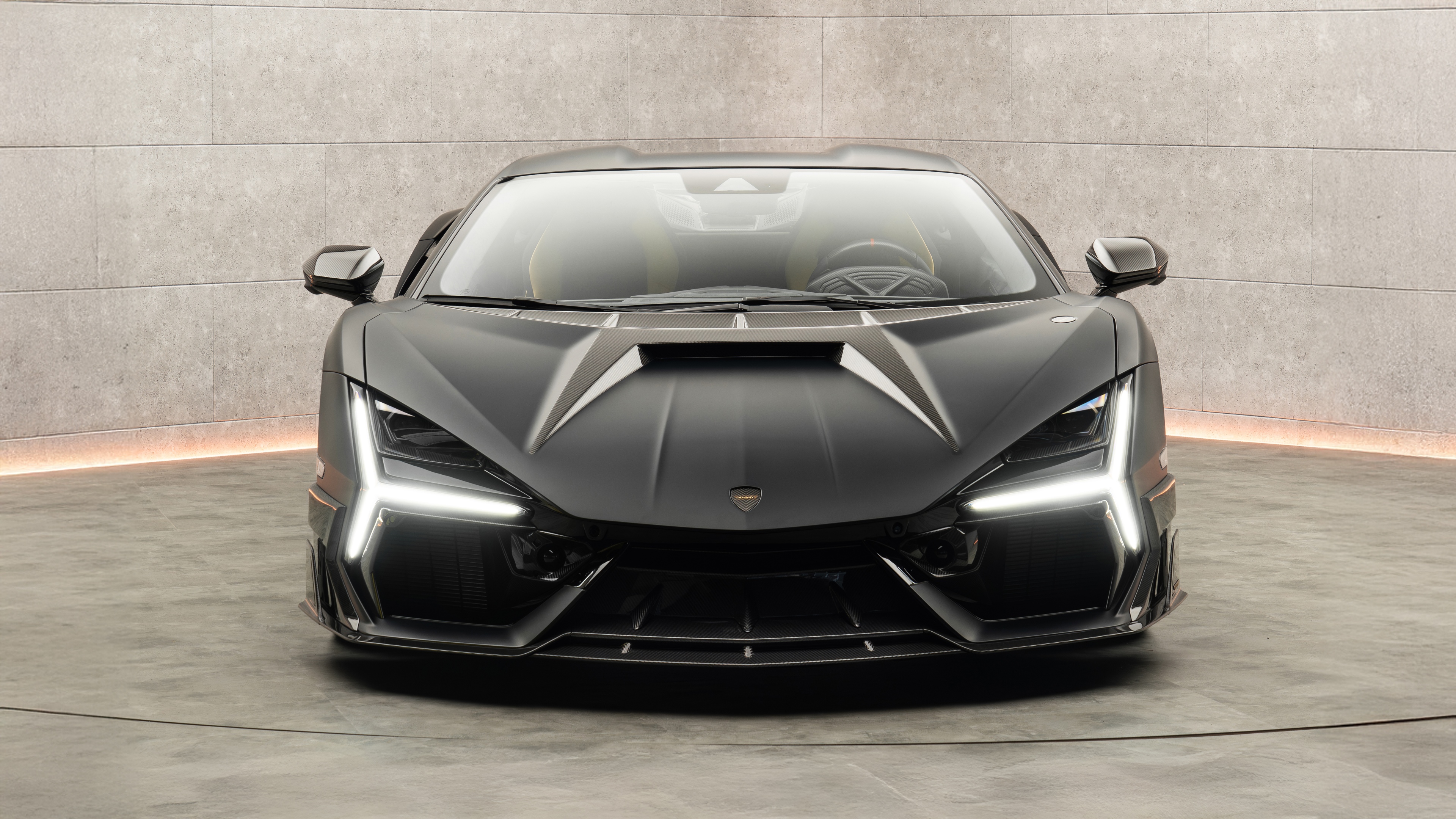 Detailed close-up view of a Lamborghini Revuelto hypercar in high resolution.