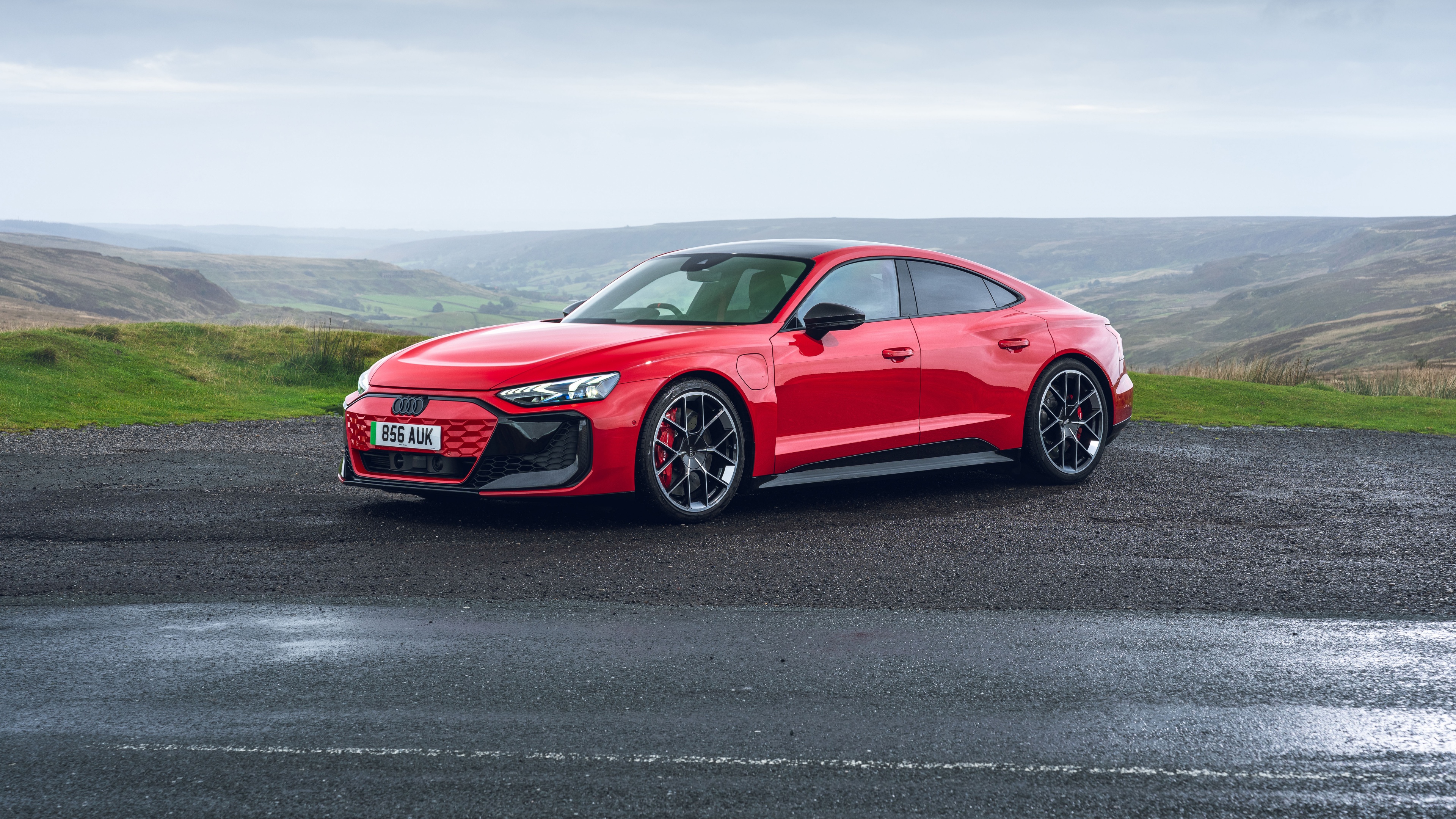 A high-detail, 8K resolution view of the 2024 Audi RS e-tron GT electric sports car.