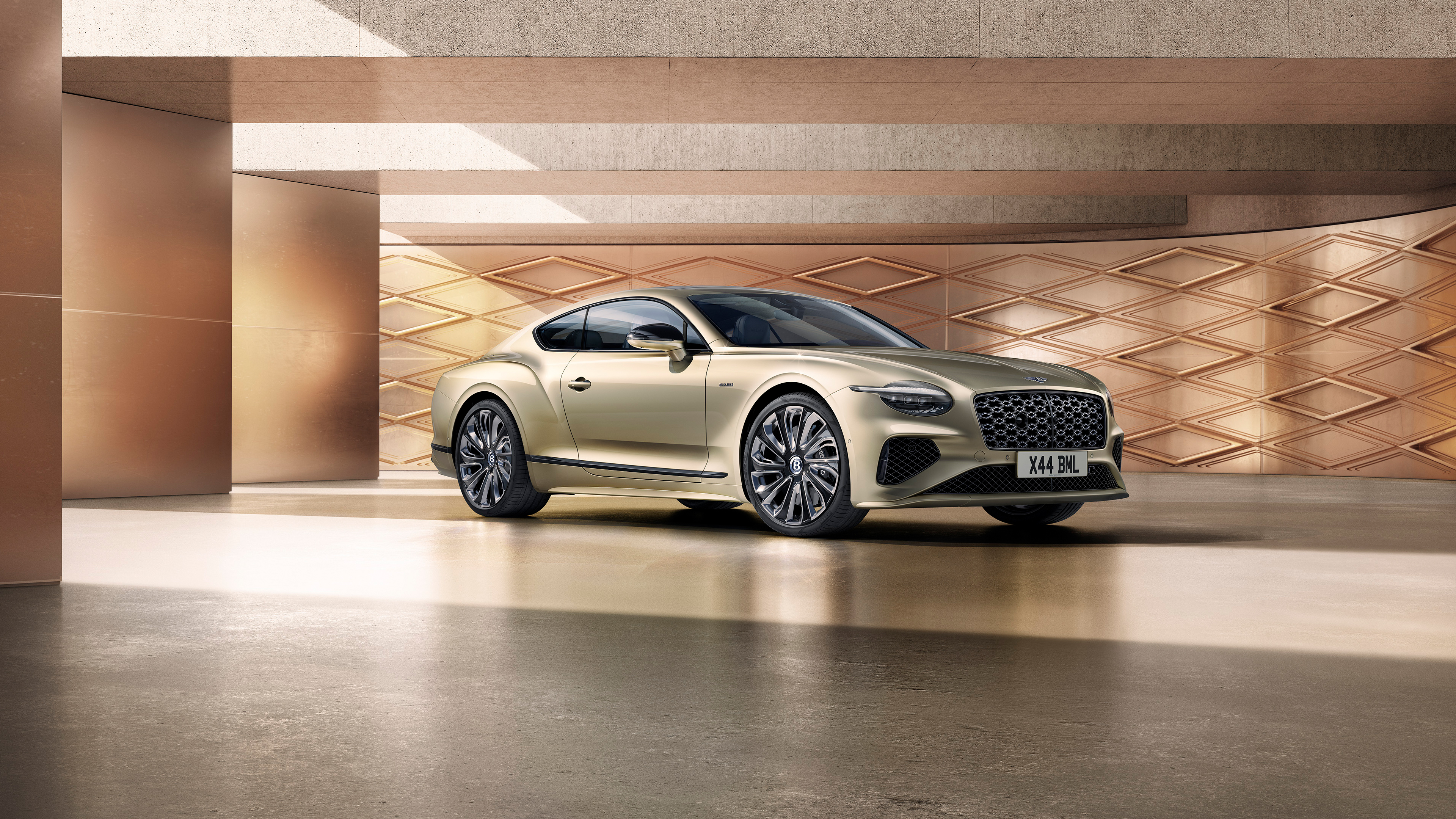 A luxurious 2024 Bentley Continental GT Mulliner coupe featuring elegant lines and premium automotive design.
