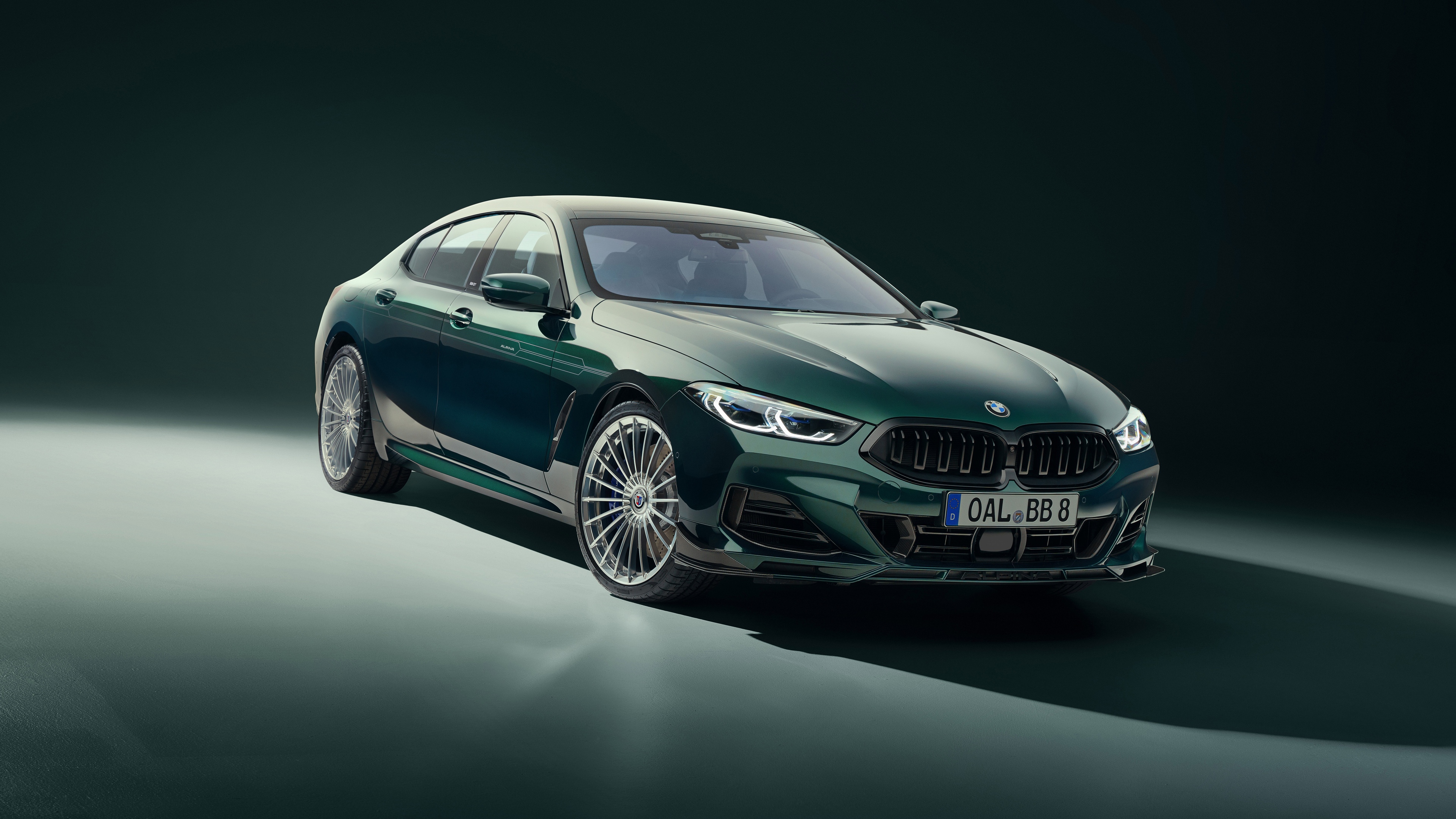 High-resolution professional shot of the 2025 Alpina B8 GT Gran Coupe featuring its sleek aerodynamic design and luxury finish.