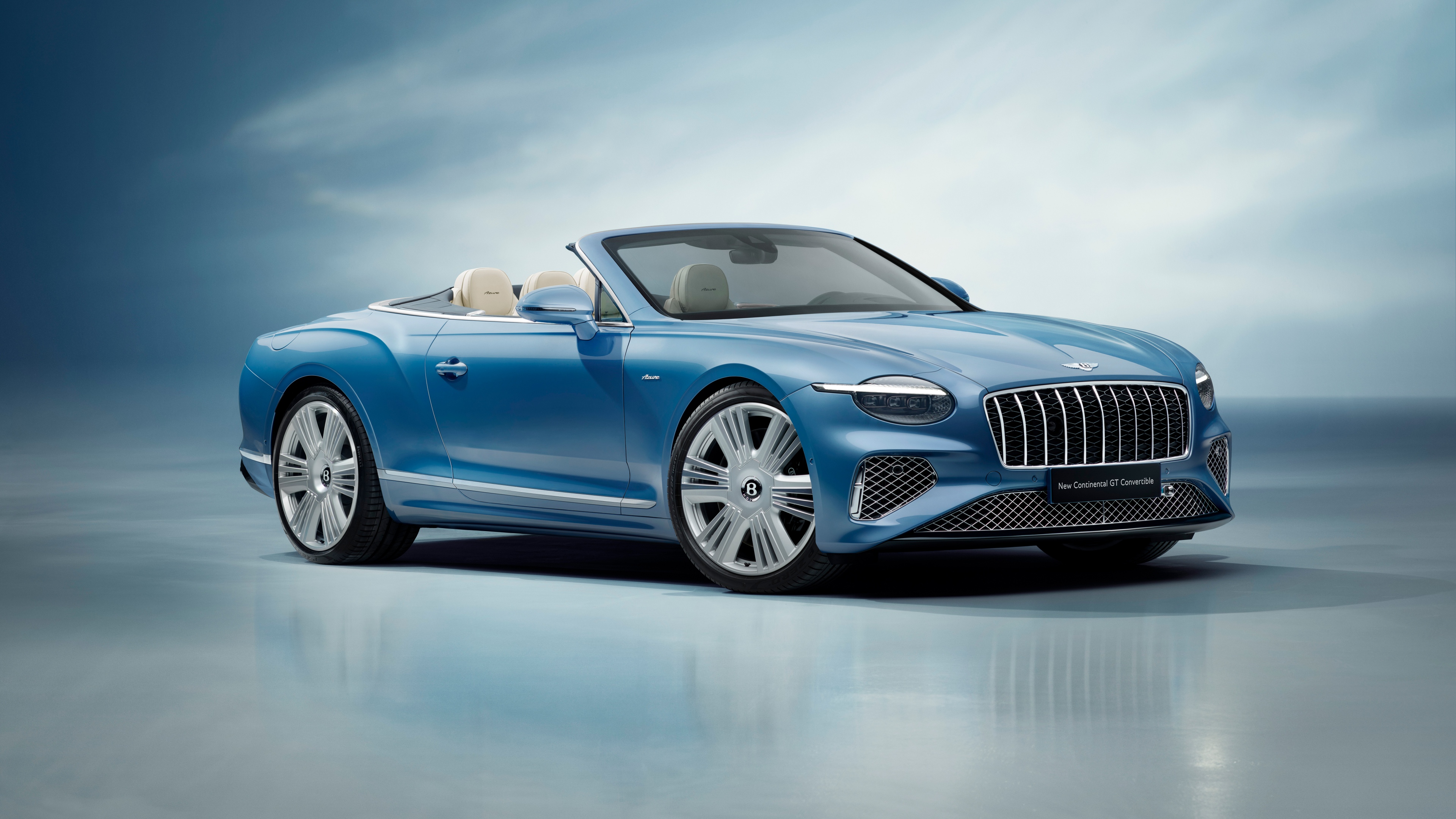 A high-resolution, detailed view of the 2025 Bentley Continental GT Azure Convertible in a luxurious setting.
