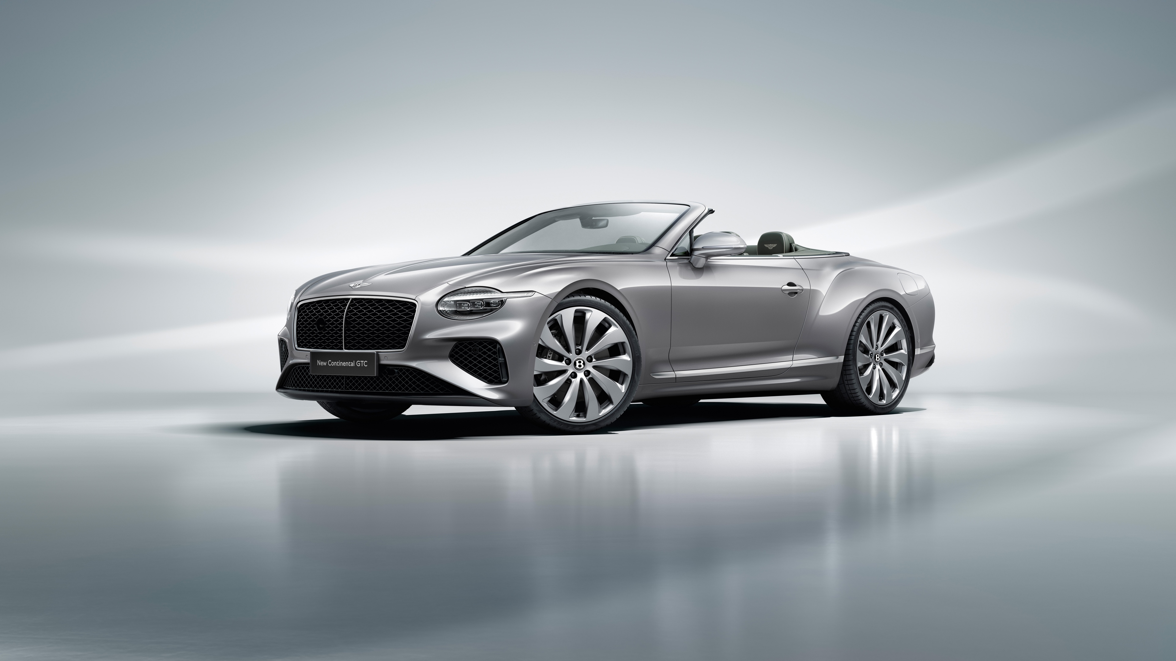 A stunning close-up of the 2025 Bentley Continental GT Convertible showcasing its sleek luxury finish and elegant silhouette.