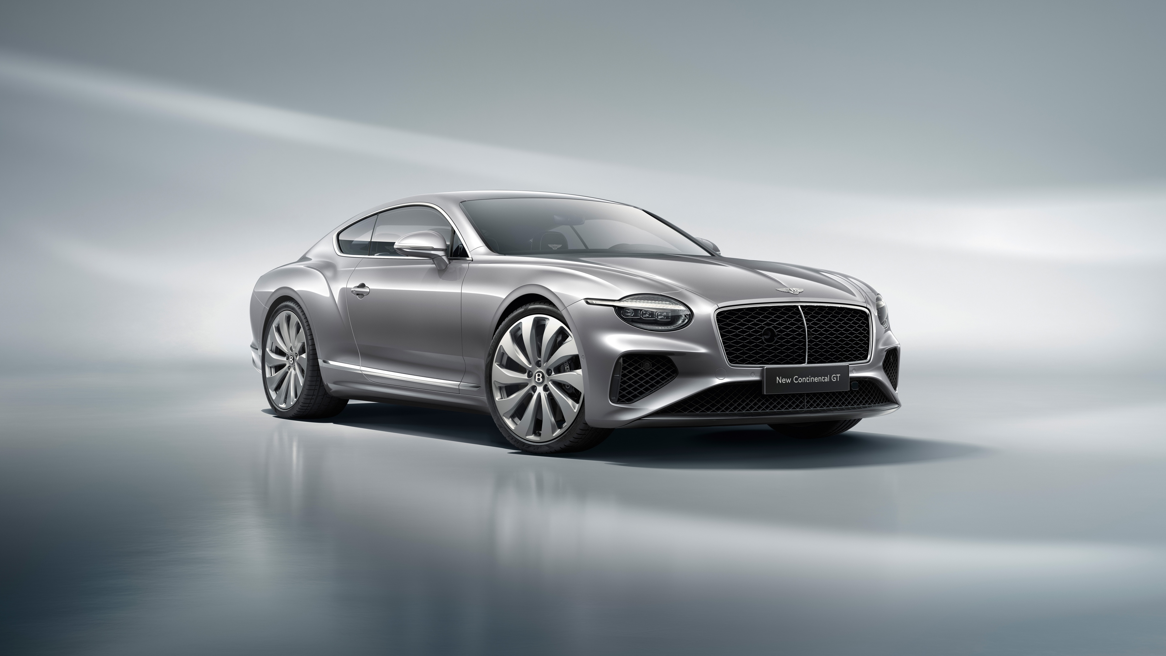 A high-resolution, cinematic shot of the 2025 Bentley Continental GT featuring sleek lines and luxury design.