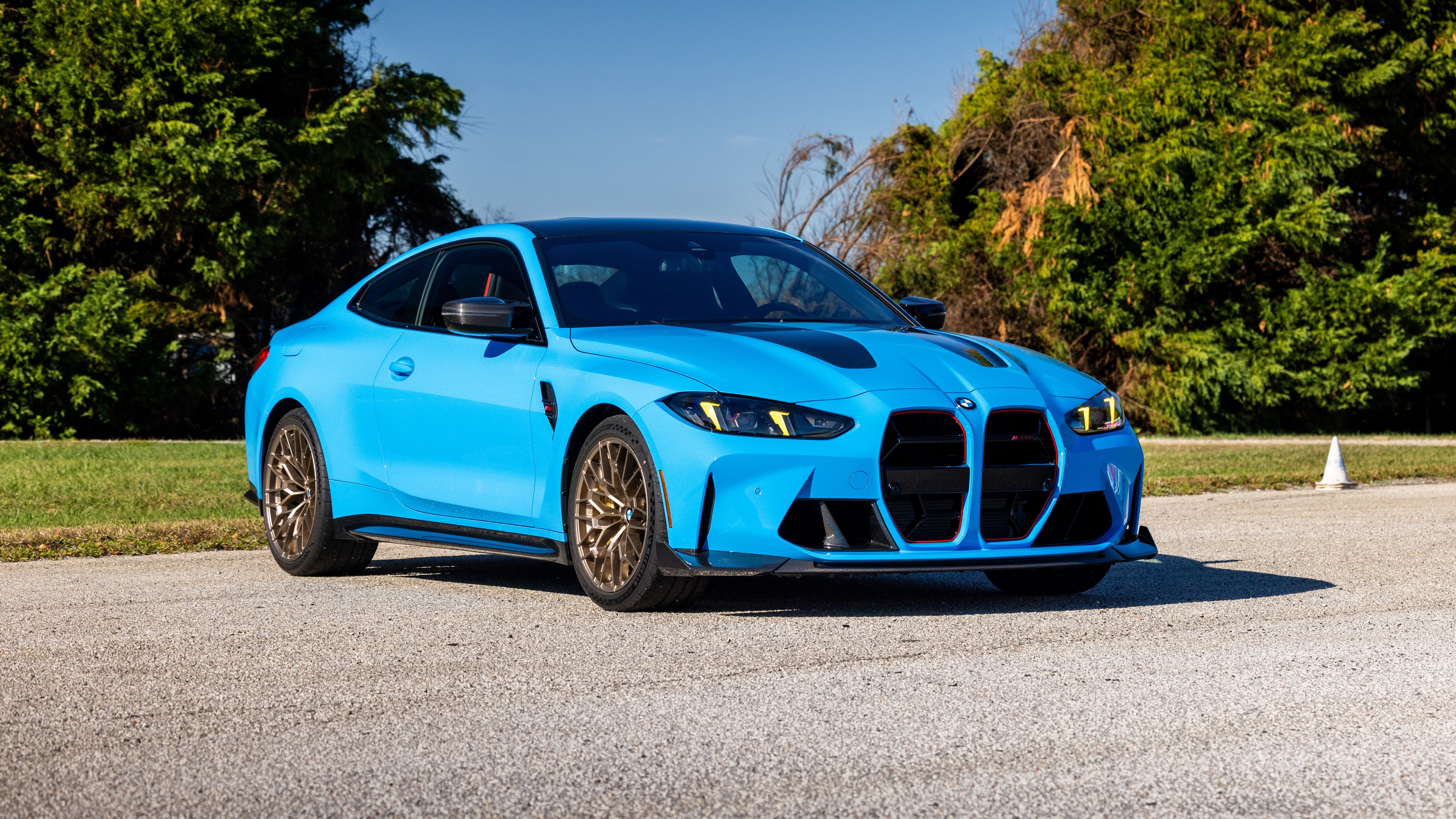 Detailed view of the 2025 BMW M4 CS featuring its aerodynamic body and premium finish.