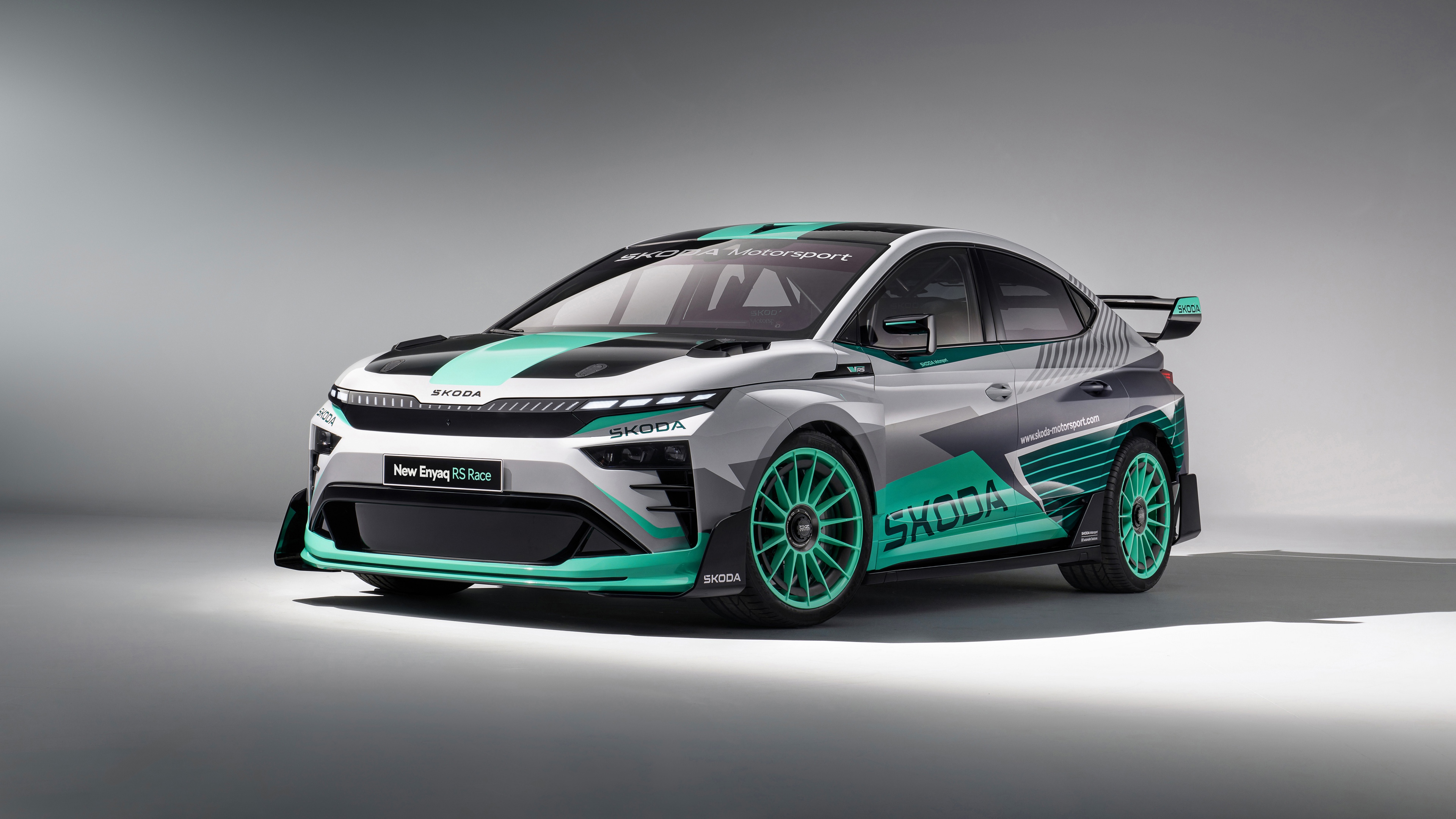 A detailed 5K rendering of futuristic and sleek electric concept race cars designed for the 2025 racing season.