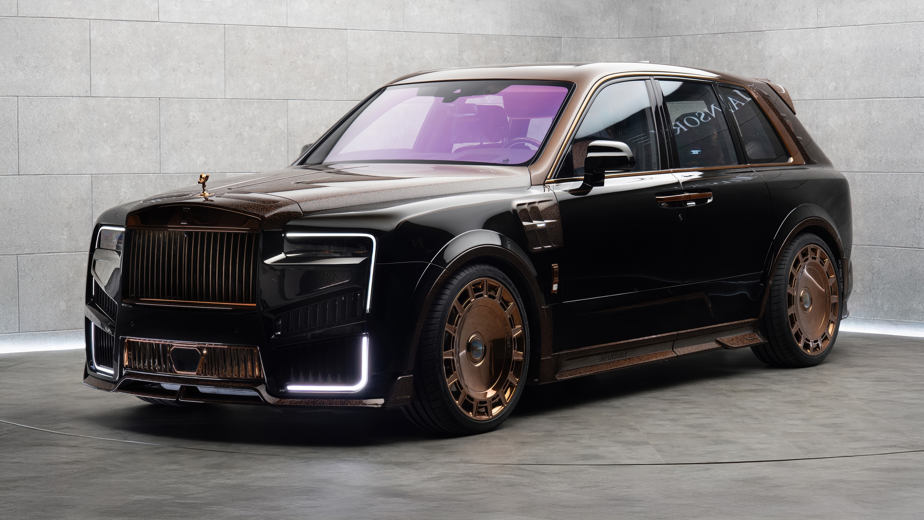A highly customized 2025 Mansory Rolls-Royce Cullinan featuring a premium widebody kit and luxury automotive finishes.