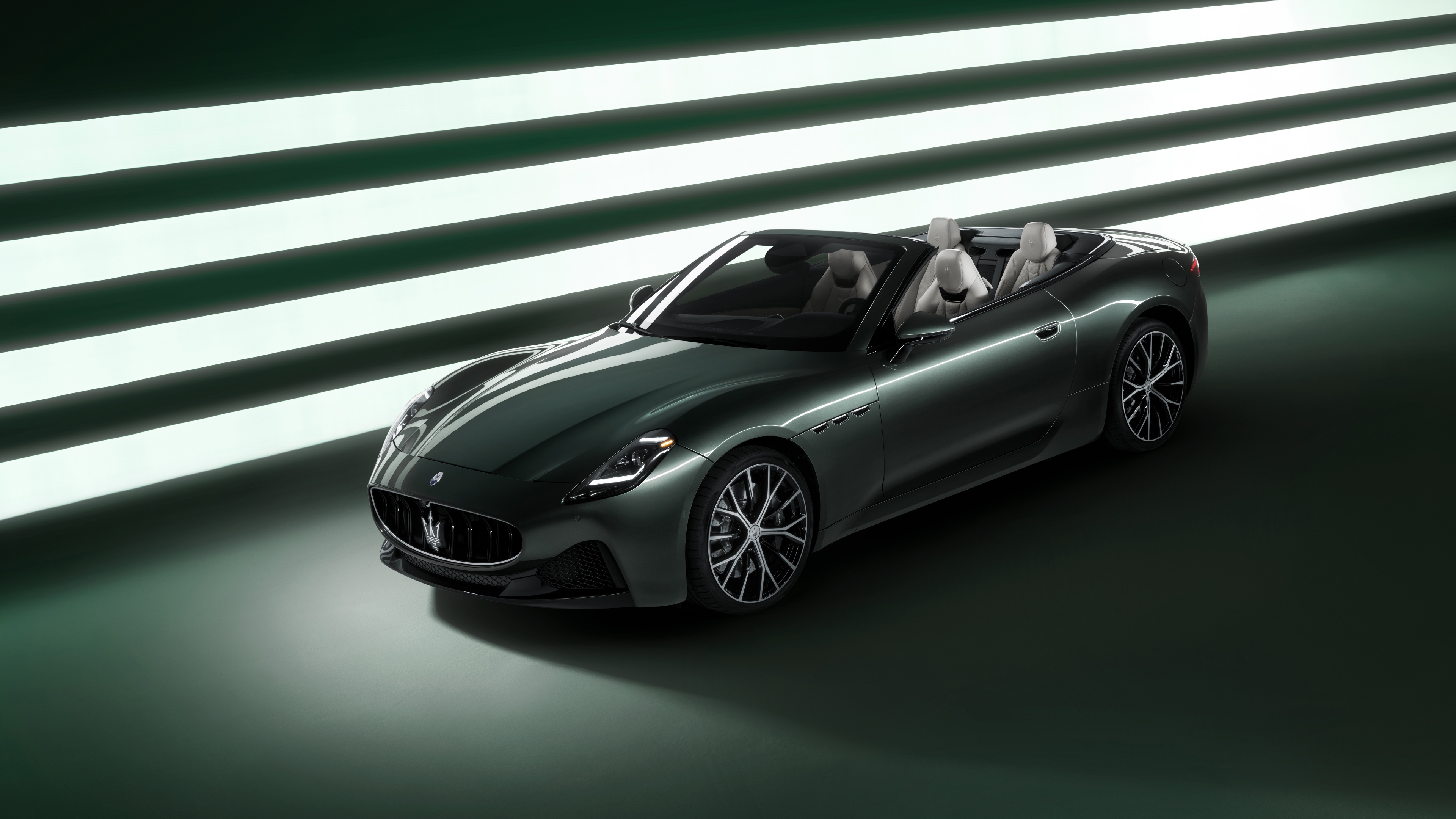 A highly detailed, 8K resolution view of the 2025 Maserati GranCabrio luxury convertible.