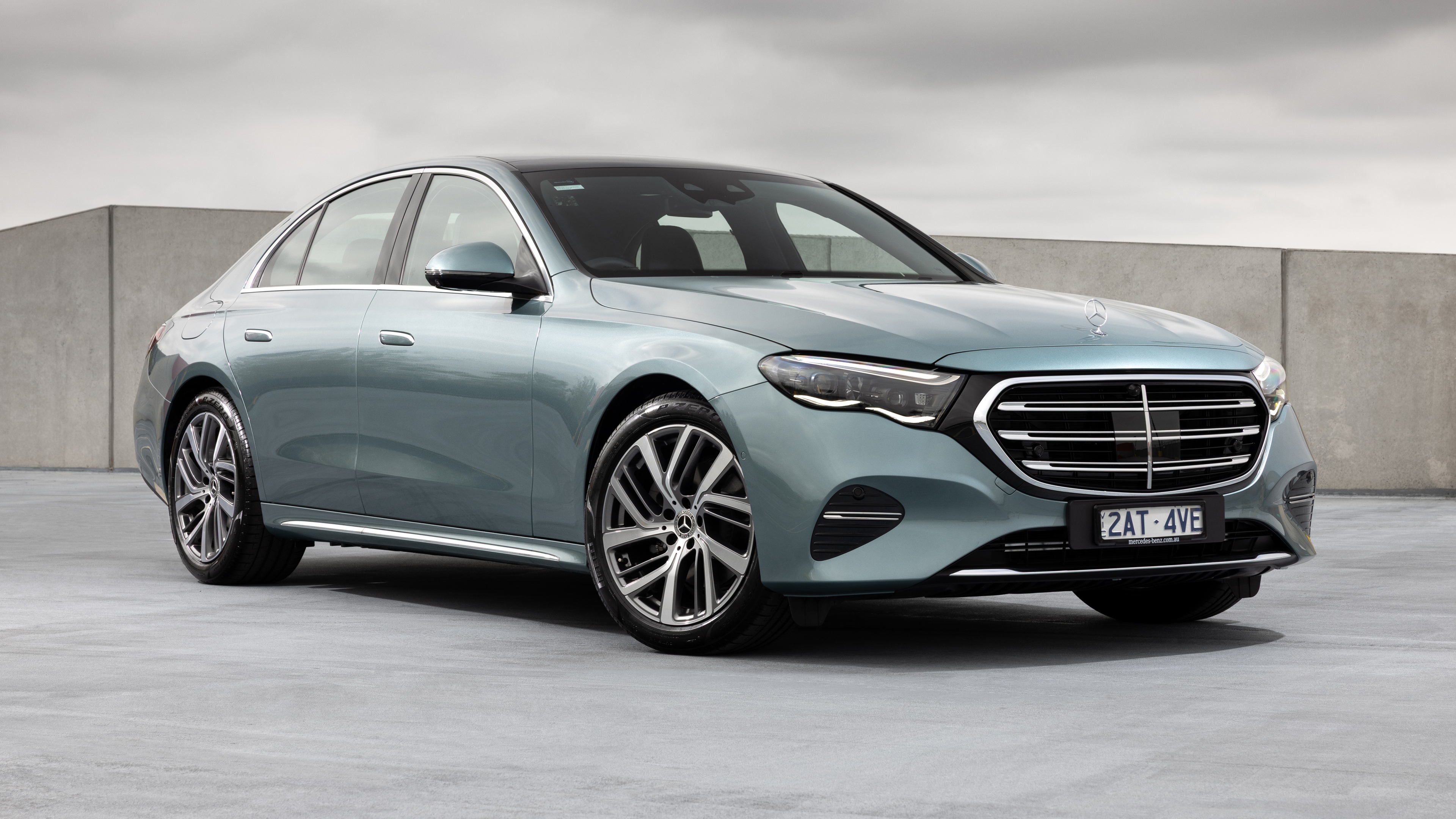 A high-detail, cinematic shot of the 2025 Mercedes-Benz E-Class luxury sedan.