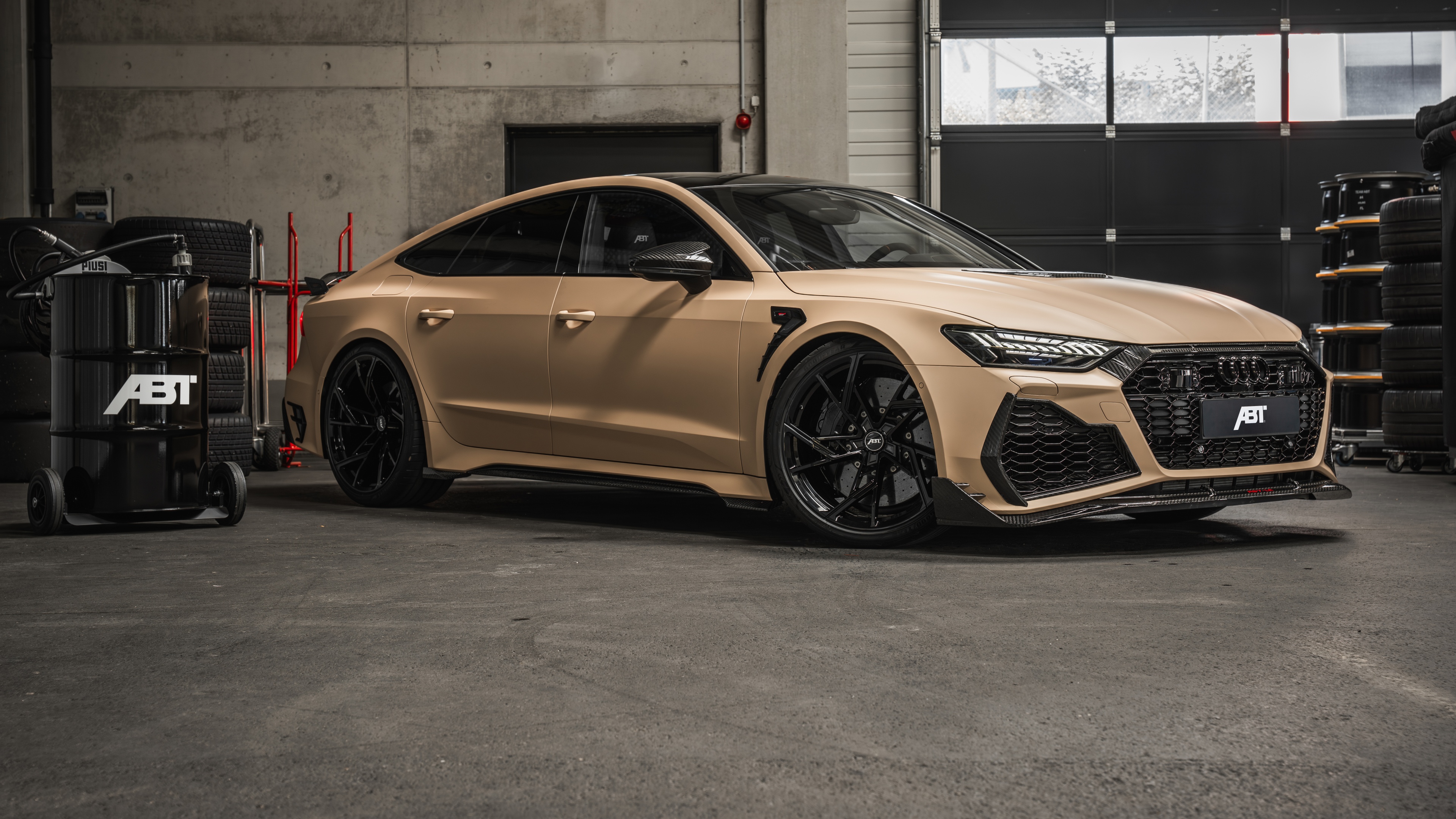 A high-detail, 8K resolution shot of a customized ABT Audi RS7 luxury sports car.