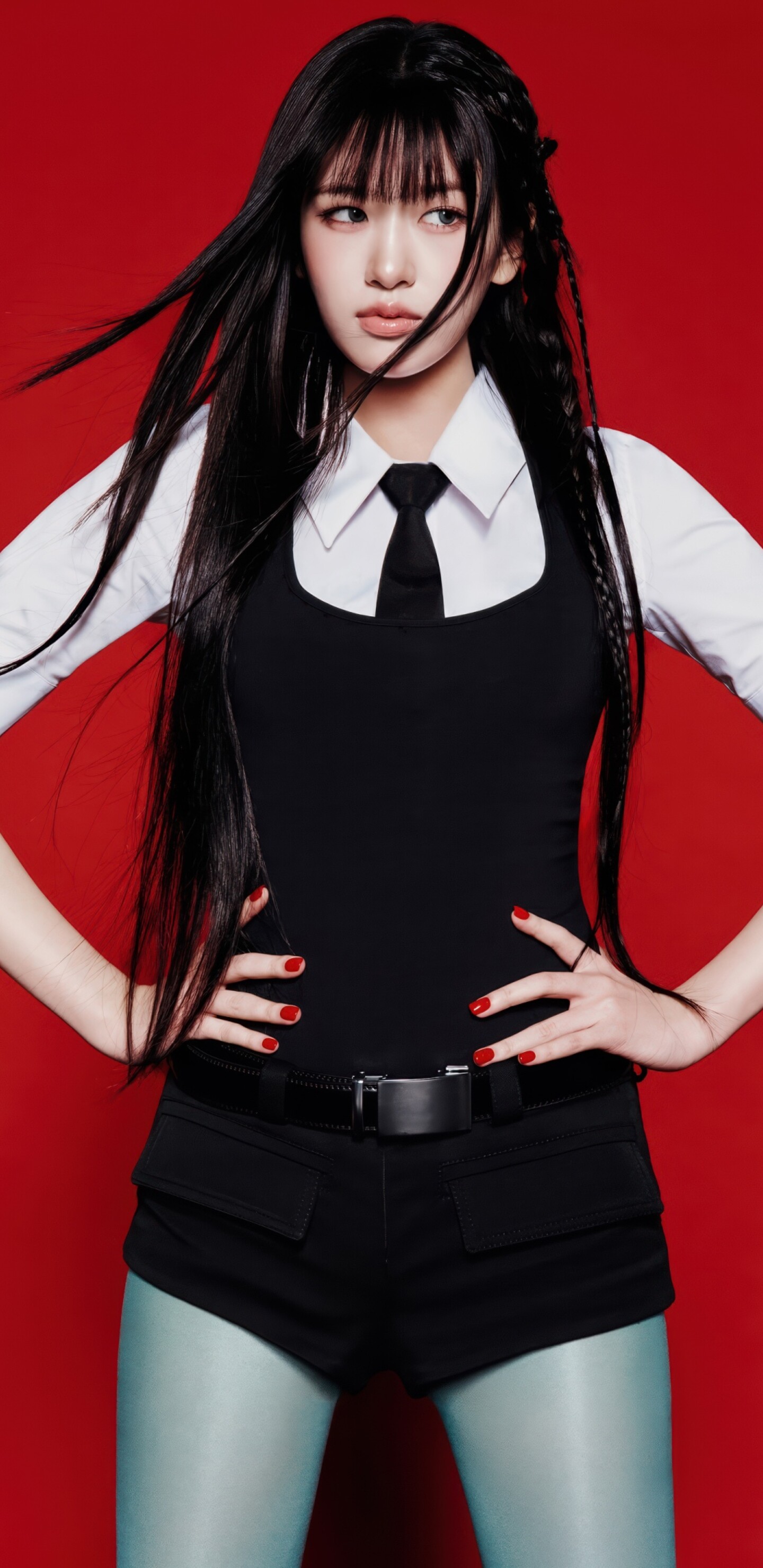 An Yujin from the K-pop group IVE posing in a black dress with a red background.