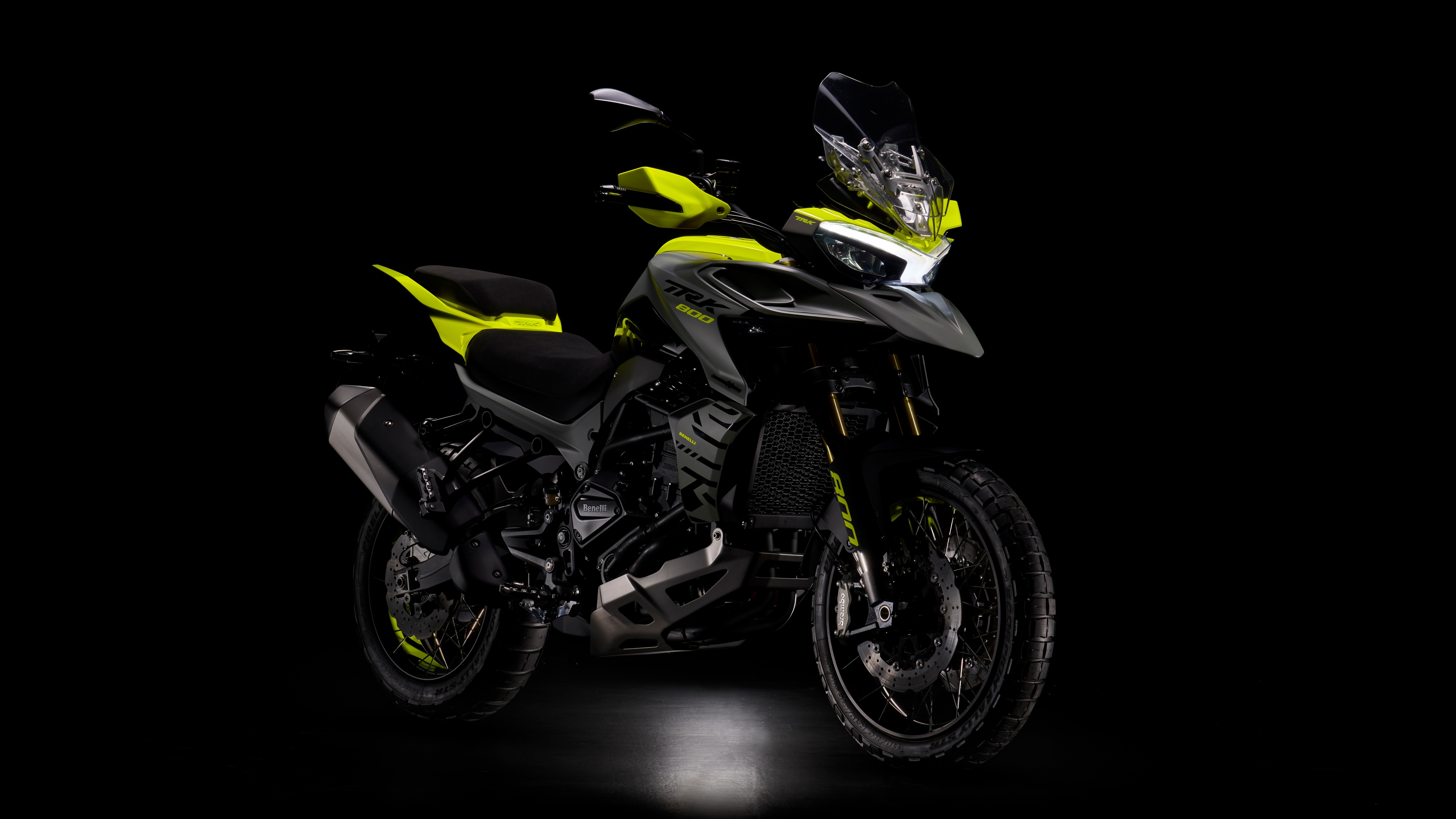 A high-detail, 8K resolution studio shot of a Benelli TRK 800 adventure touring motorcycle on a black background.