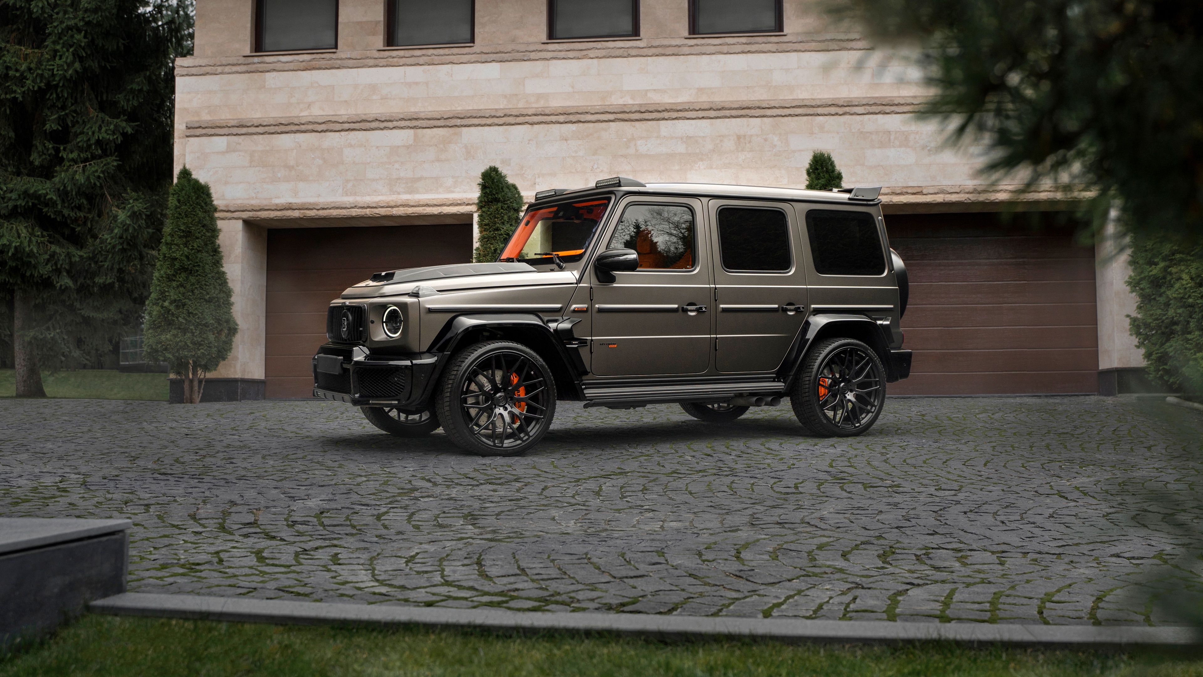 A powerful and sleek Brabus 800 Mercedes-AMG G 63 luxury SUV in a high-detail setting.