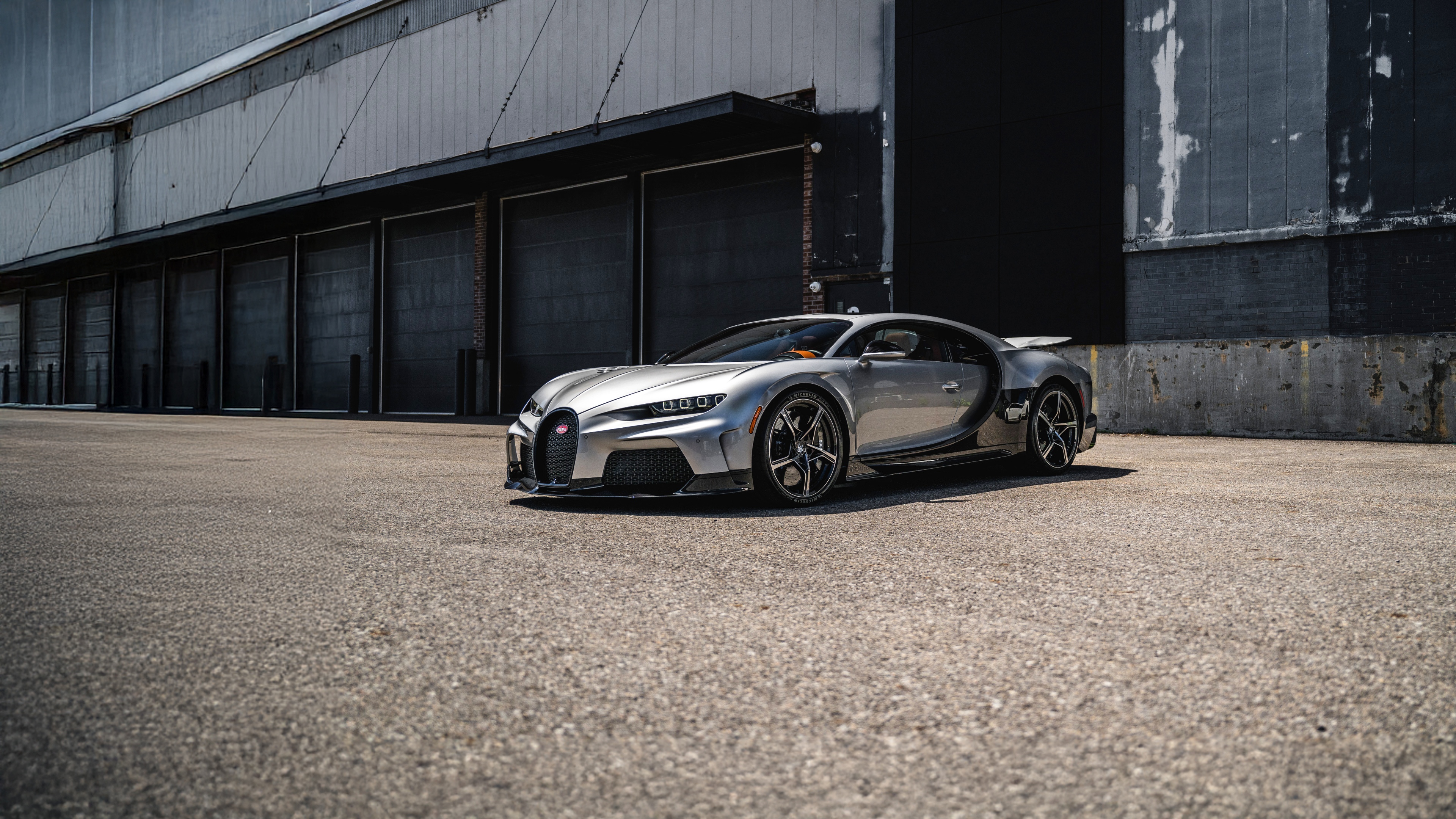 A Bugatti Chiron Super Sport hypercar parked in an outdoor setting.
