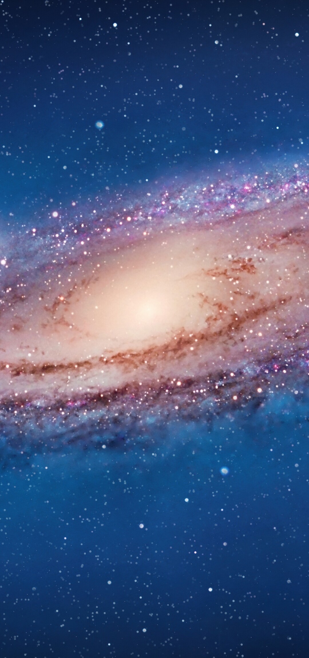 A high-definition 5K view of deep space featuring colorful nebulas and bright stars in the style of Mac OS X Lion.