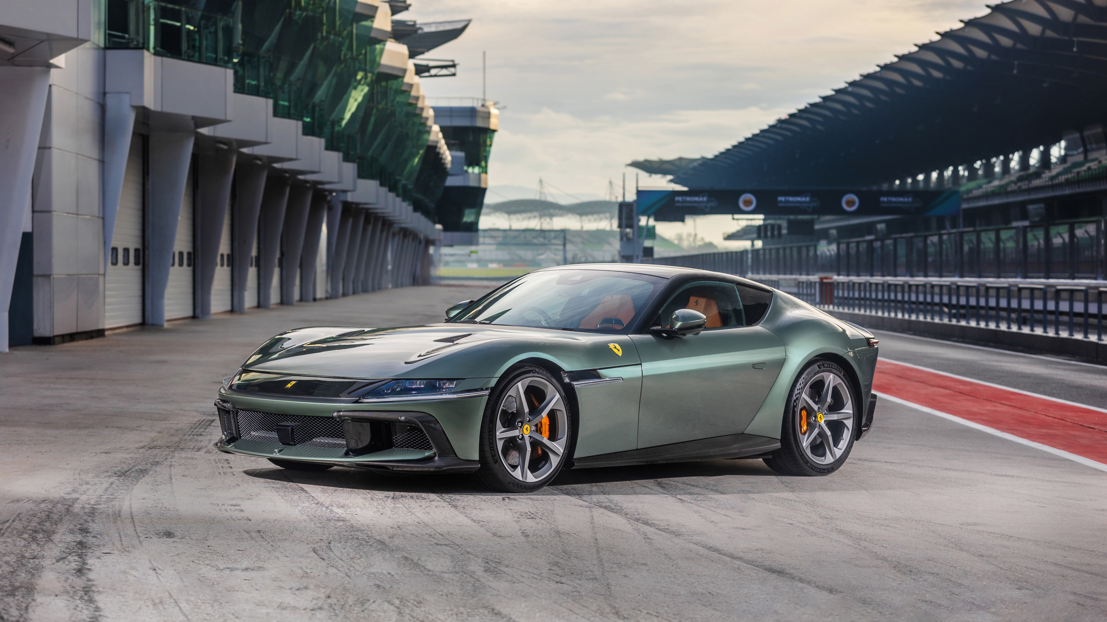 A high-resolution, detailed shot of a Ferrari 12Cilindri hypercar positioned in a scenic Malaysian setting.