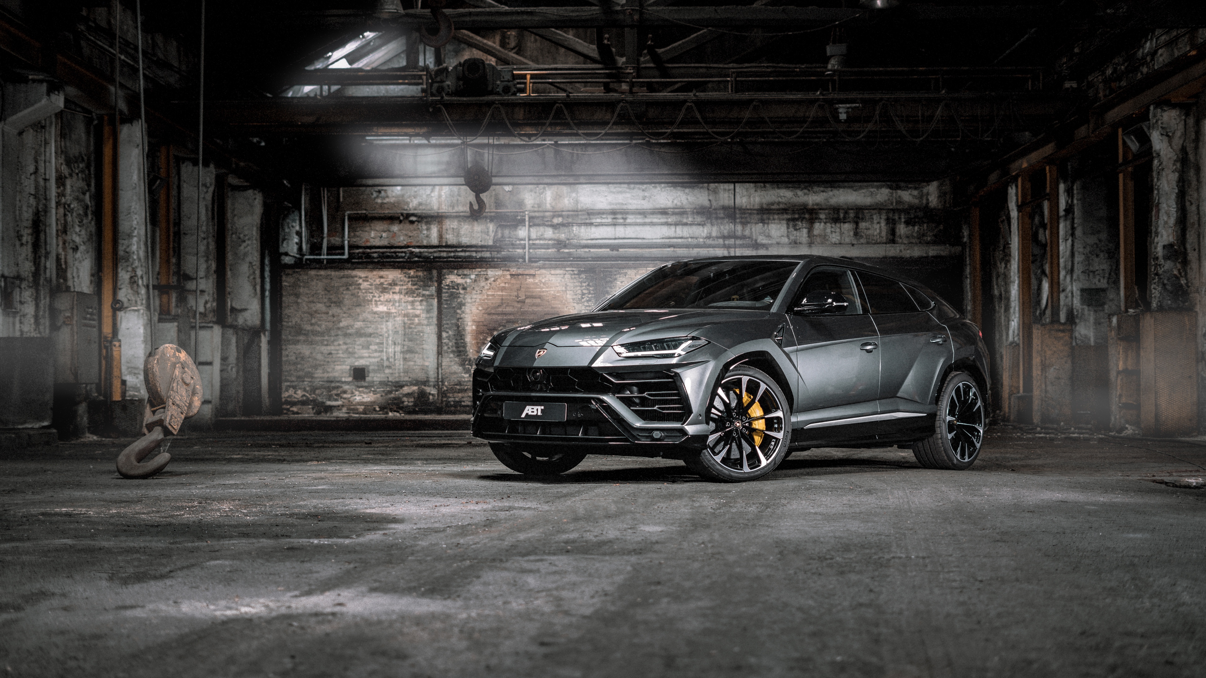 Close-up high-resolution shot of a sleek Lamborghini Urus luxury SUV.