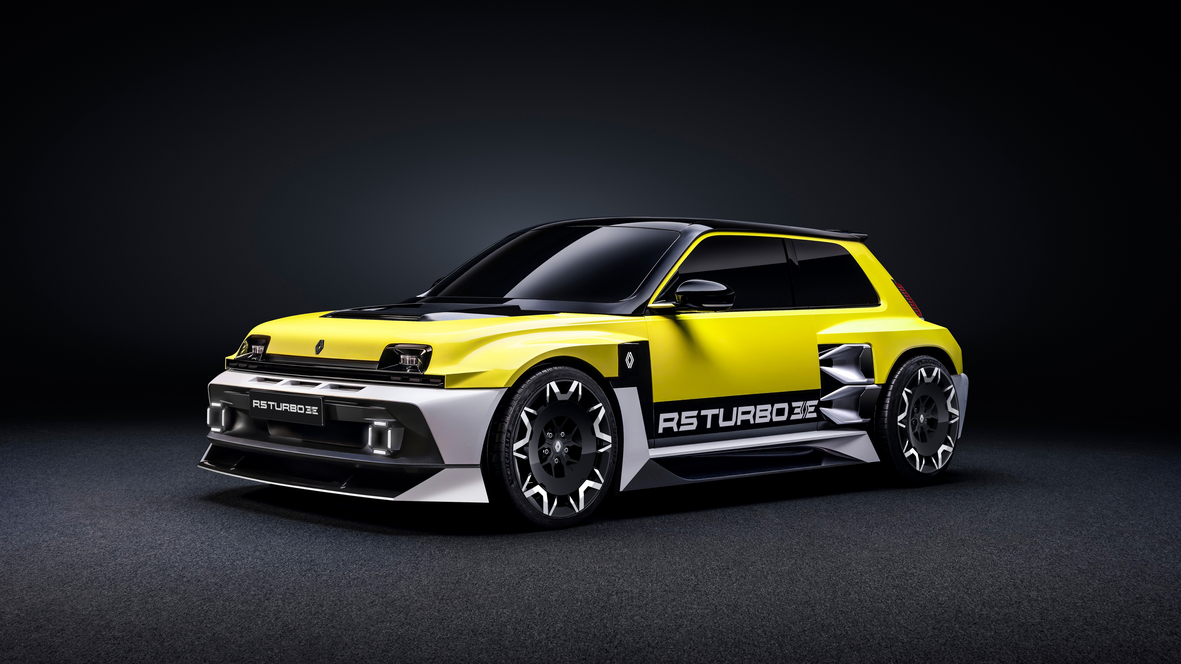 A high-resolution view of a futuristic electric concept car with glowing light accents on a dark background.