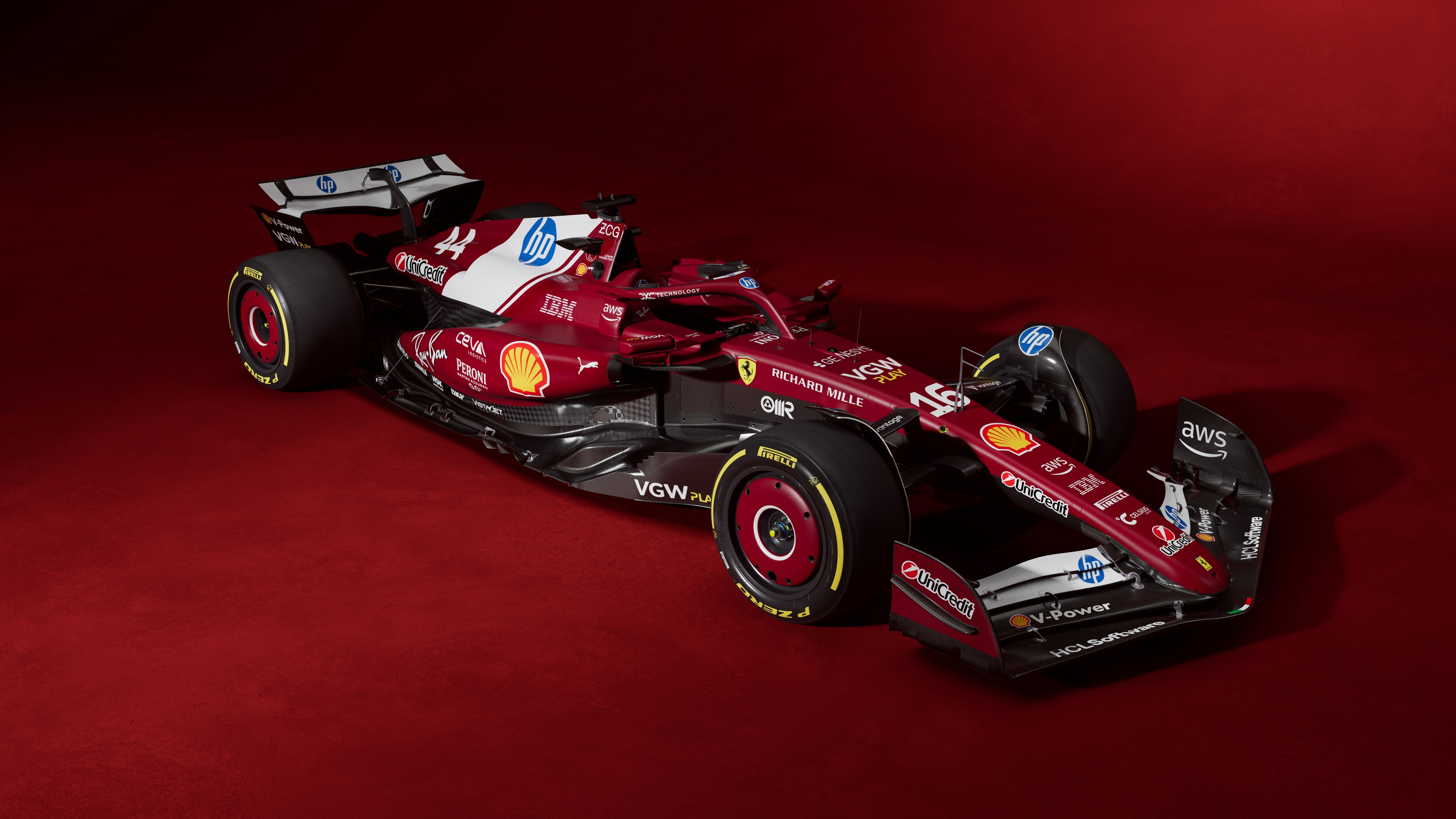 High-speed Formula 1 racing cars set against a vibrant, solid red background.