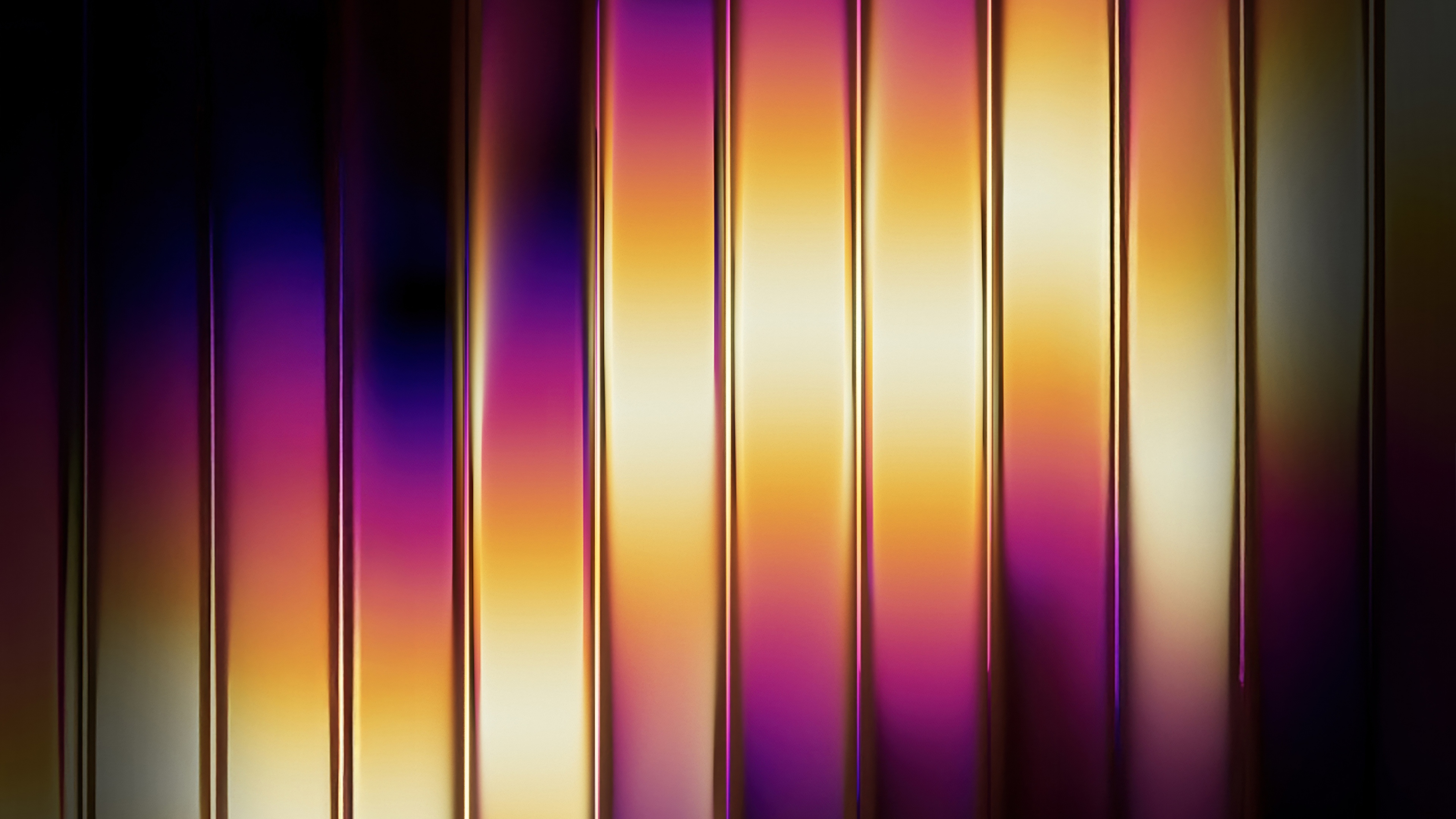 Abstract metallic design featuring golden gradient stripes and neon purple light effects.