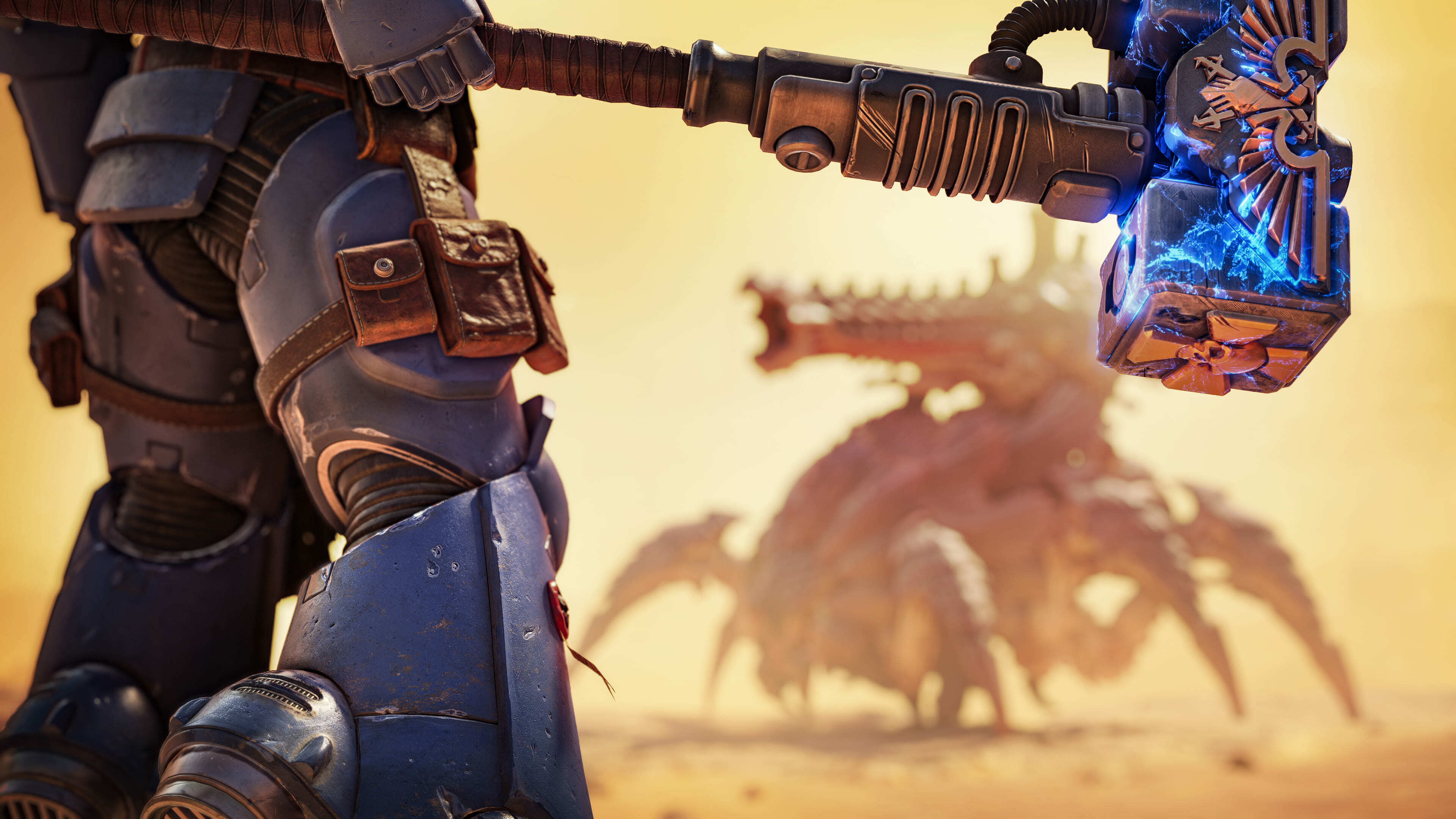 A heavily armored Space Marine from Warhammer 40,000: Space Marine 2 prepared for battle.
