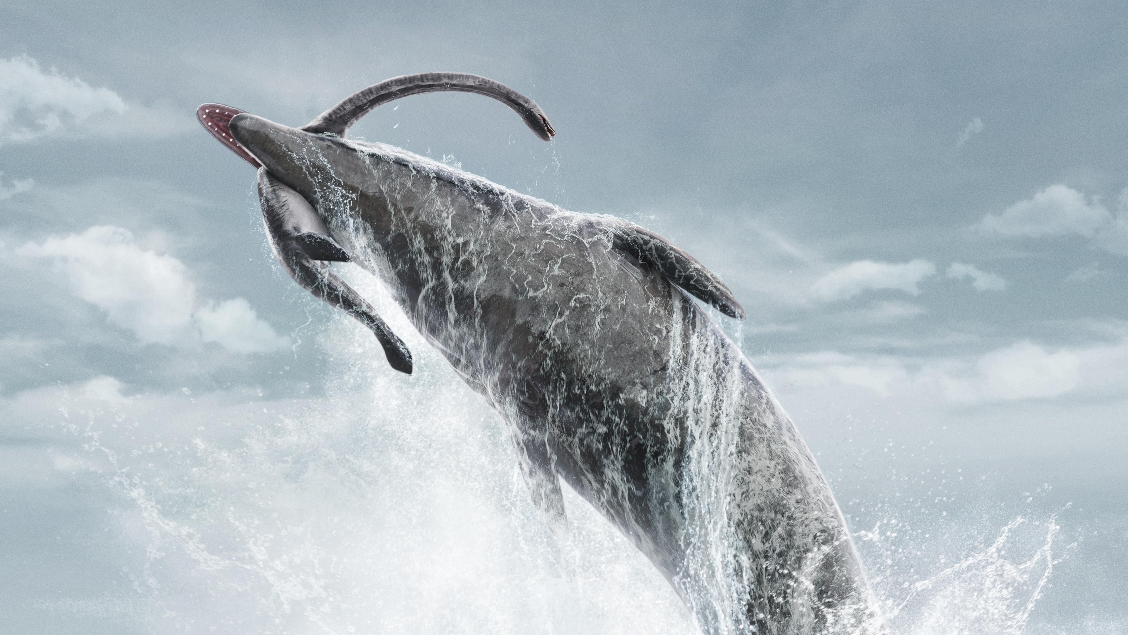 A majestic whale swimming through deep, dark blue ocean currents in high definition.