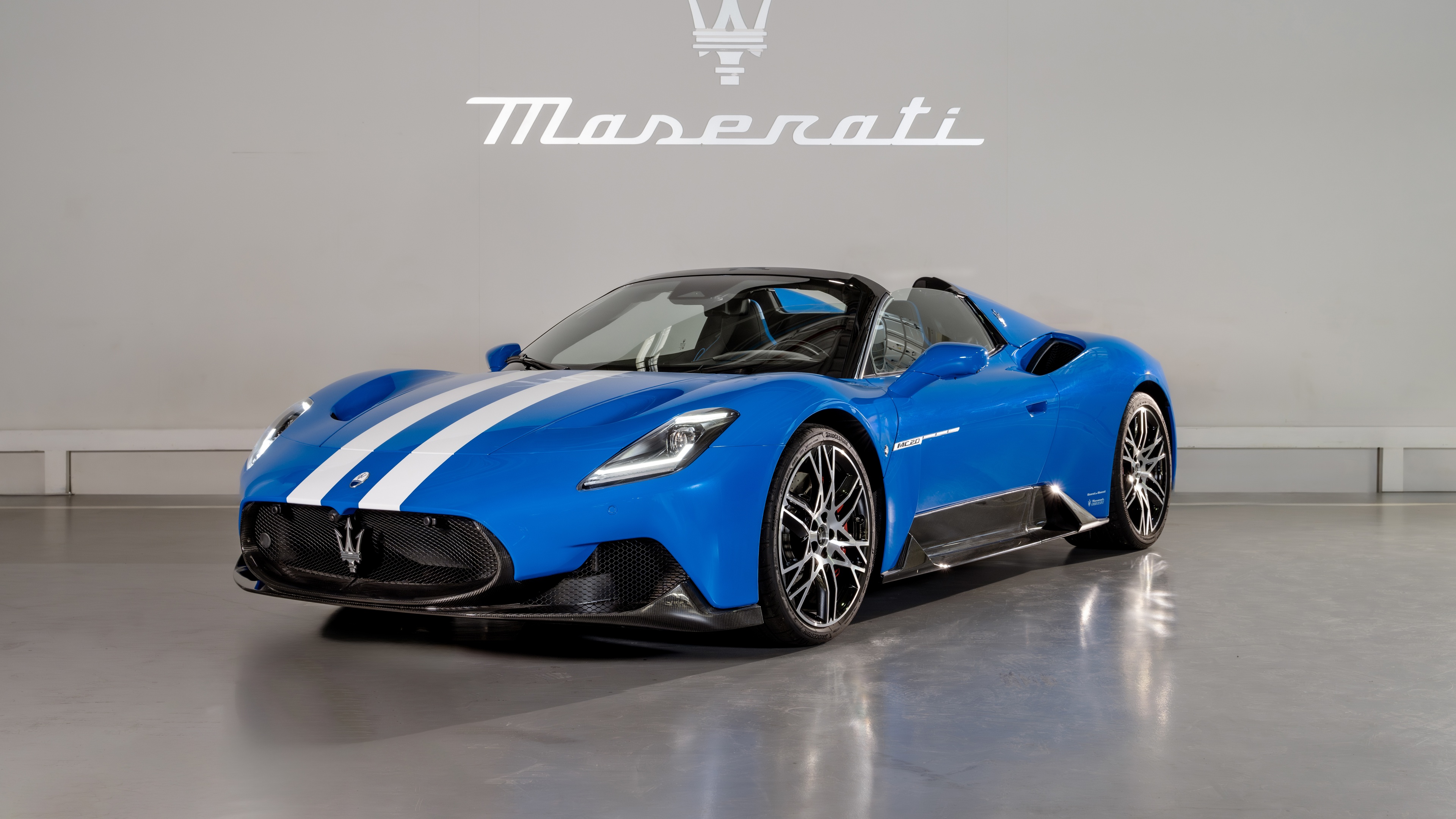 A high-resolution, detailed close-up of a luxury Maserati MC20 supercar featuring bespoke design elements.