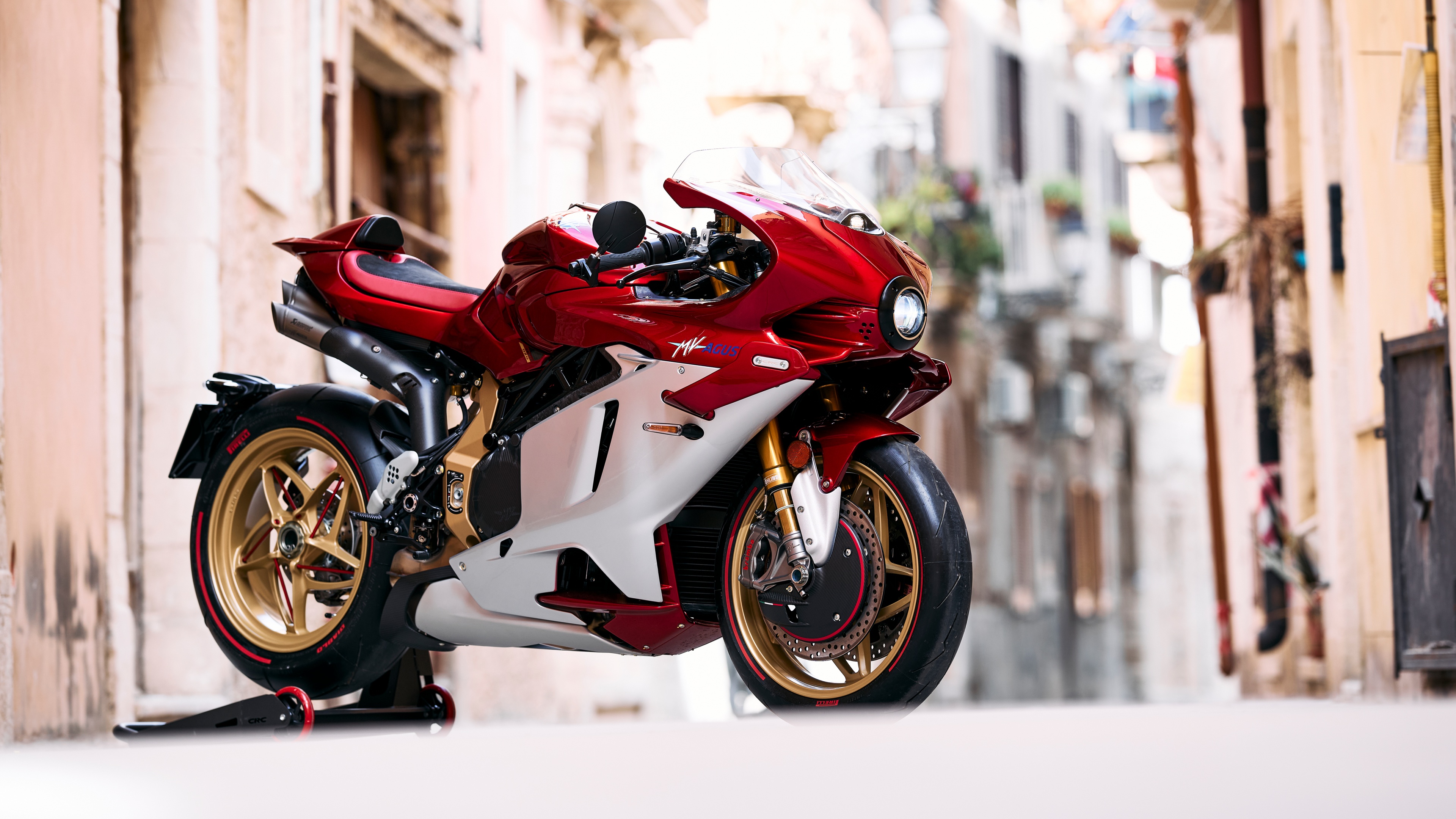 Close-up of the MV Agusta Supervelocke 1000 Serie Oro 2024 sports motorcycle with premium gold detailing.