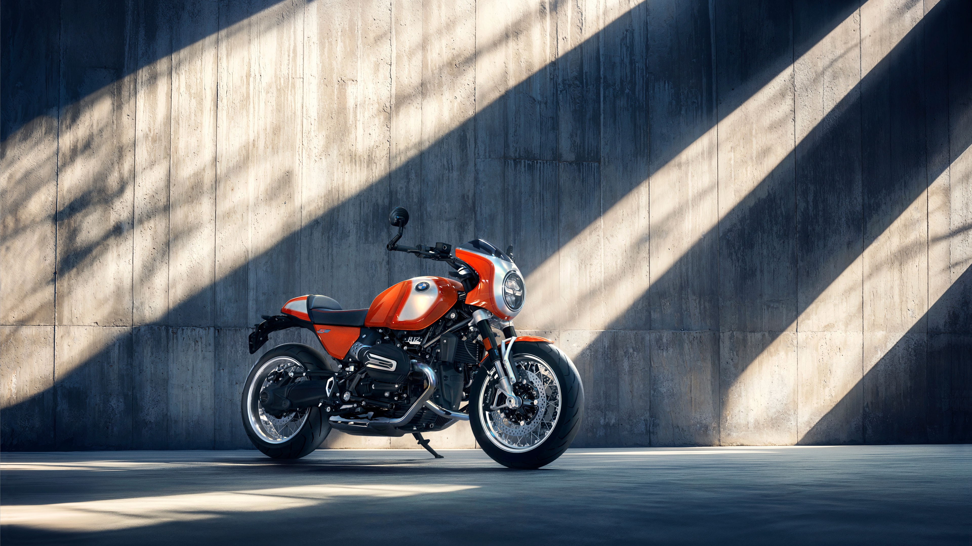 Detailed close-up of a retro-style cafe racer motorcycle with chrome finishes and a sleek, aerodynamic frame.