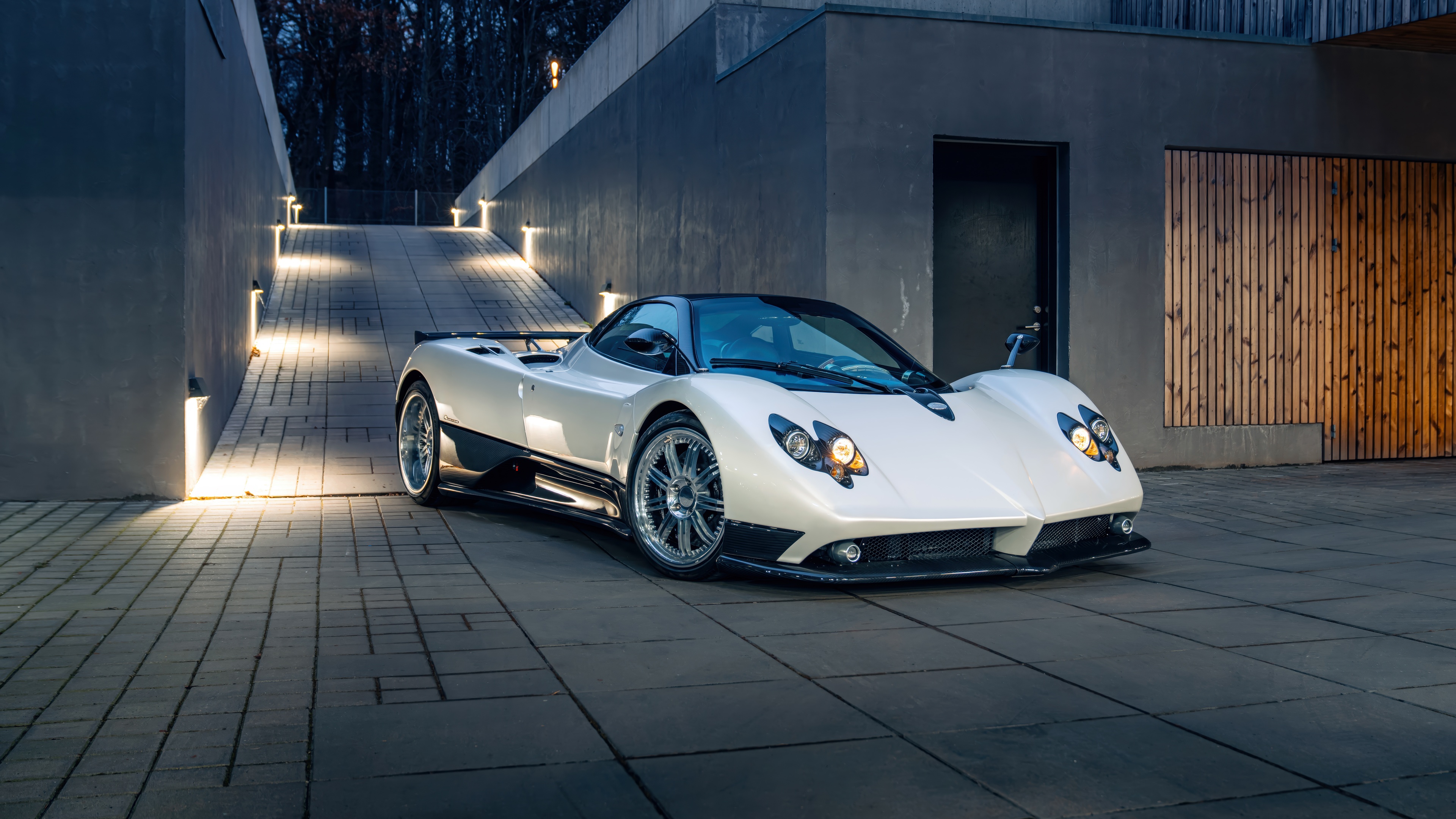 A high-resolution, detailed shot of a Pagani Zonda F hyper sports car featuring sleek aerodynamic lines.