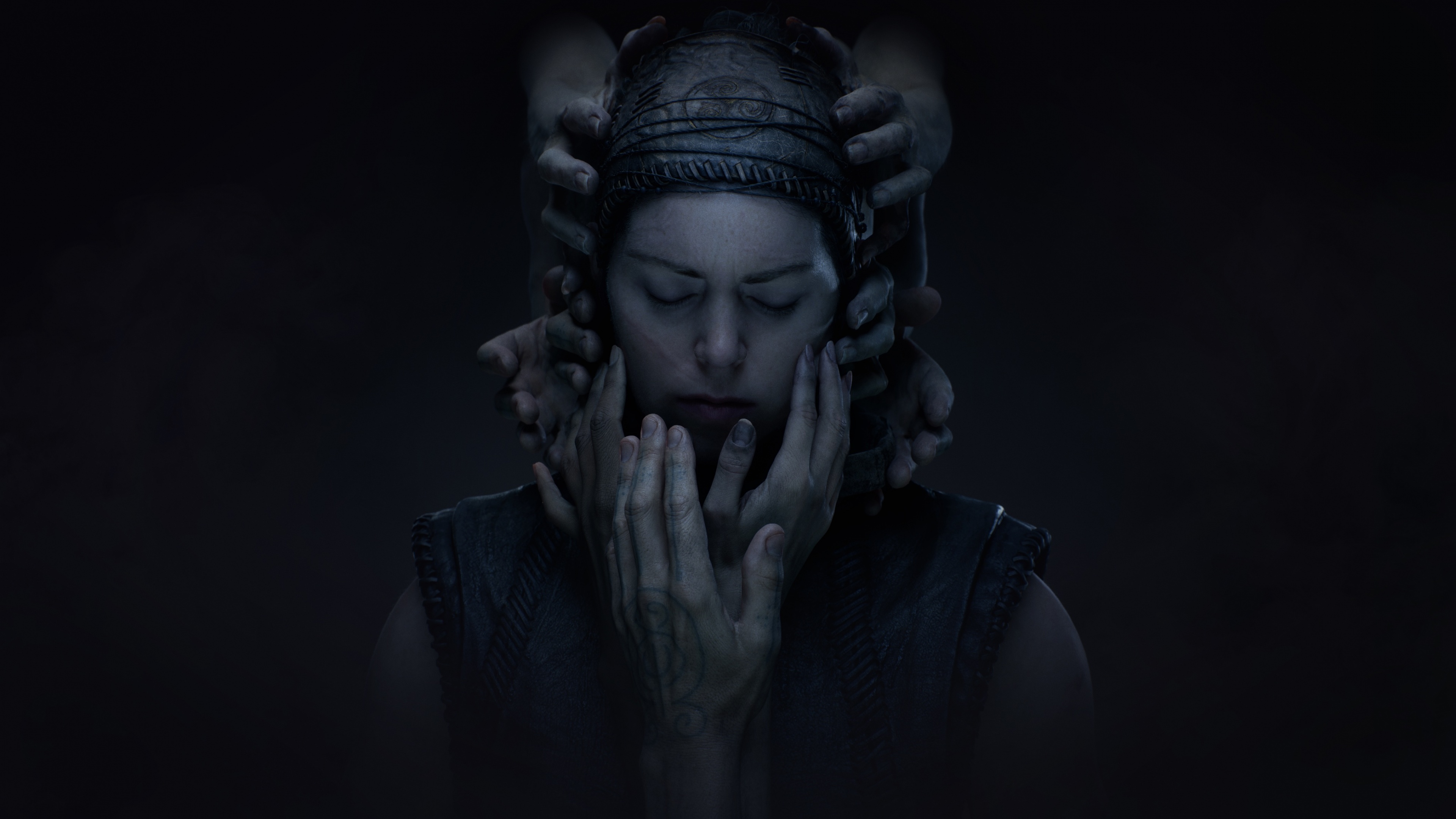 A cinematic and dark portrait of Senua from the video game Hellblade II: Senua's Saga.