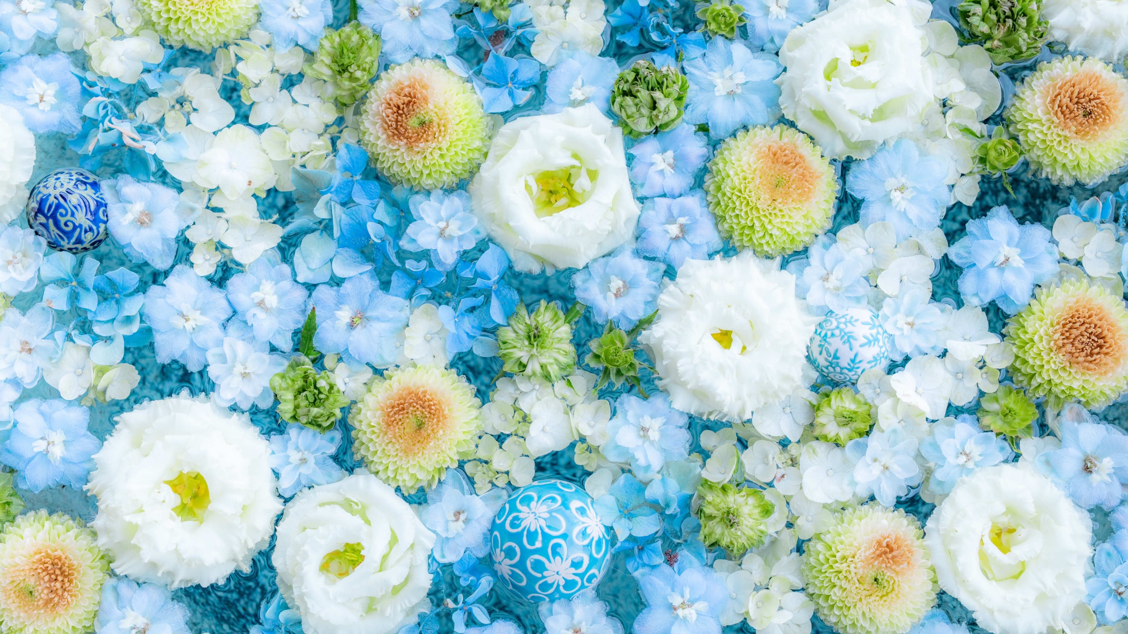 A lush bouquet of blue flowers in various shades, creating a serene blue aesthetic.