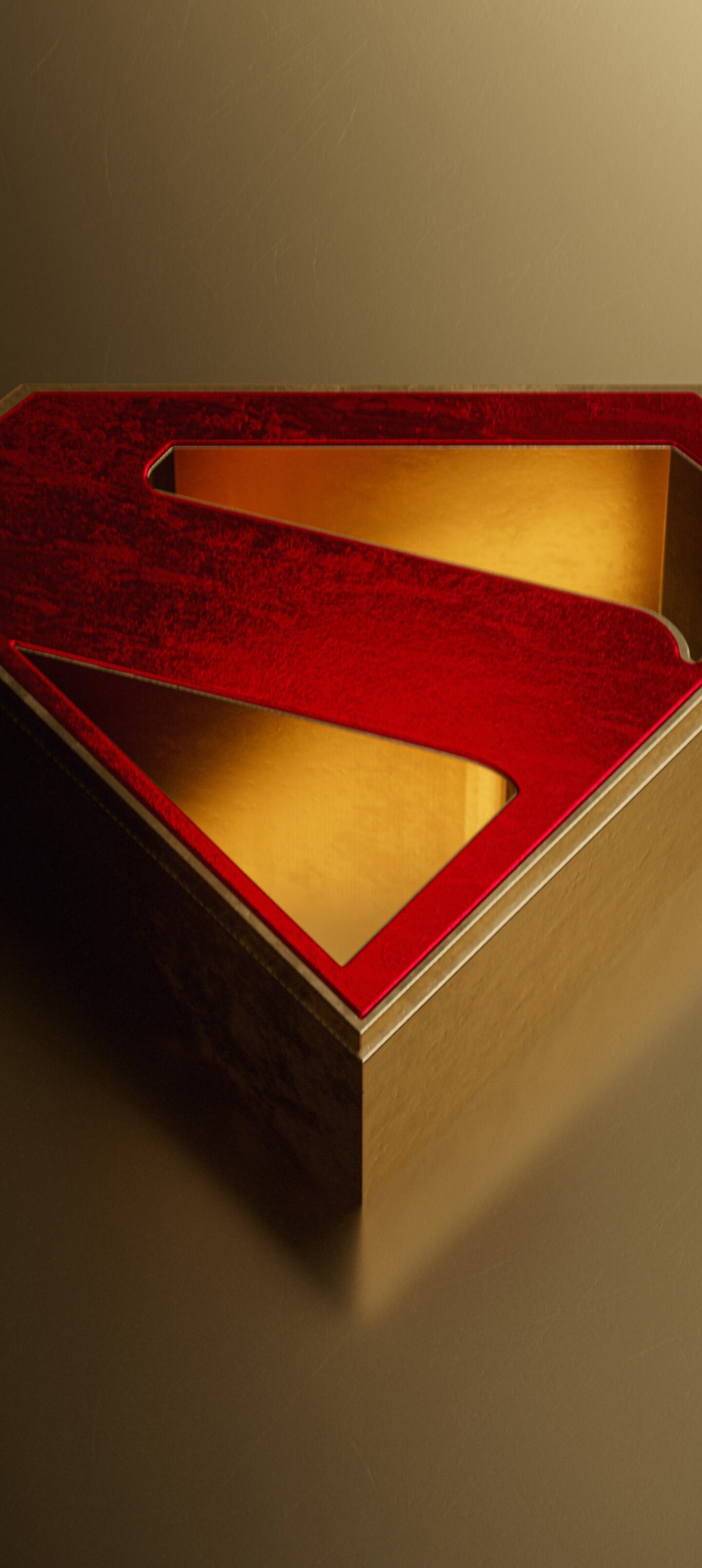 A minimalist Superman logo centered on a shimmering, high-resolution golden background.