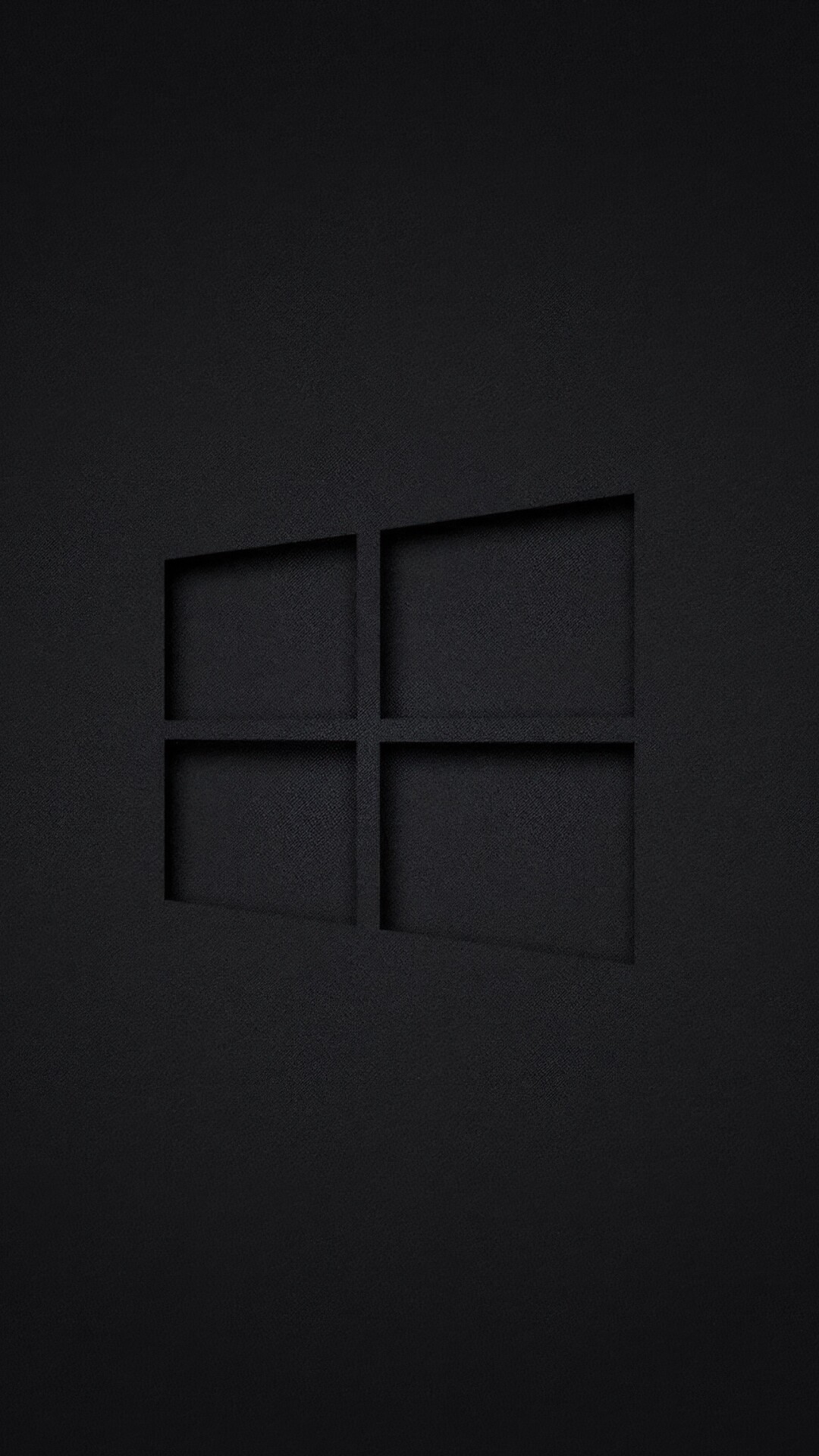 Windows 10 logo centered on a dark, minimalist background.