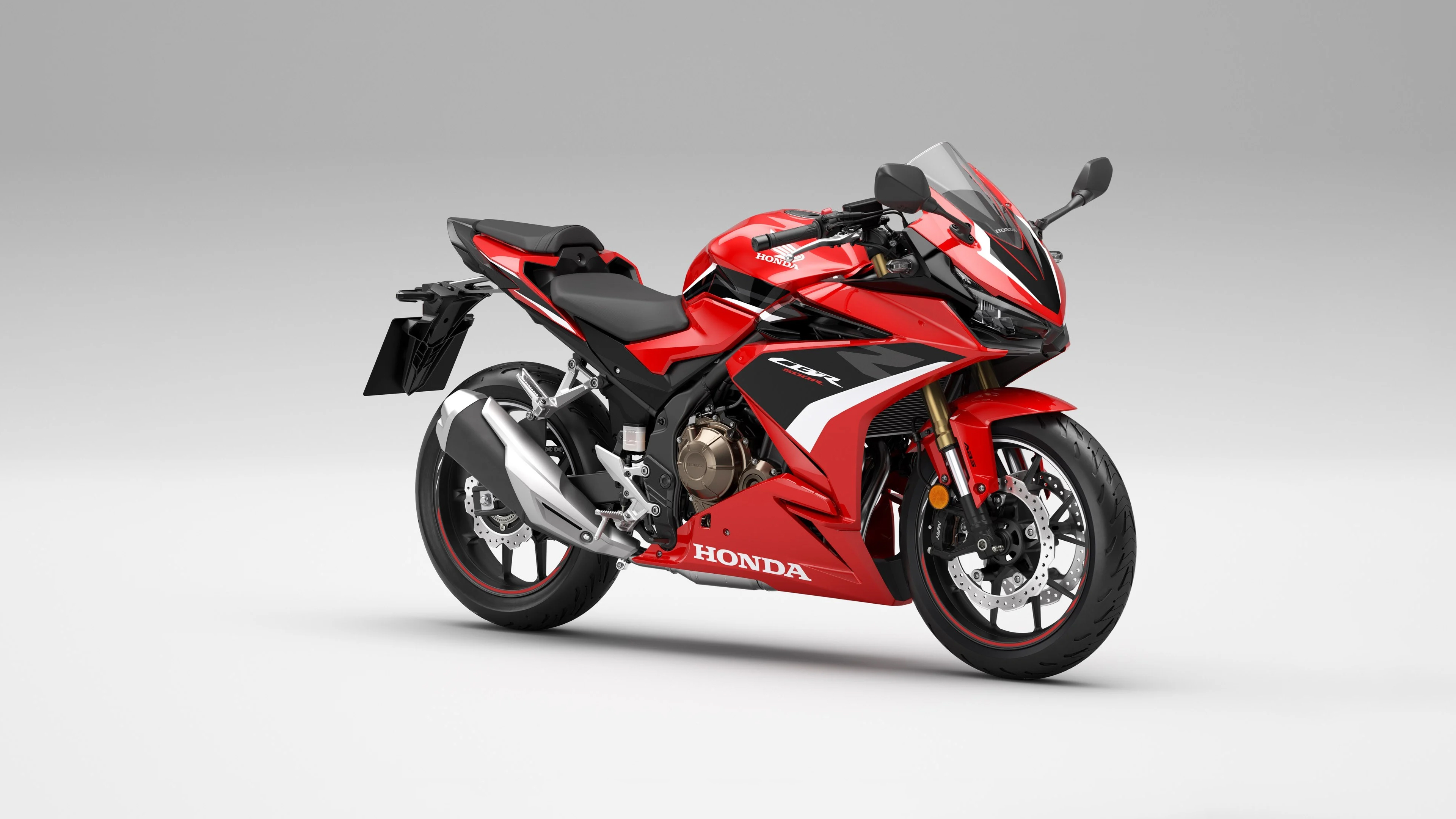 A detailed view of a 2022 Honda CB500R sports motorcycle featuring modern naked bike styling.