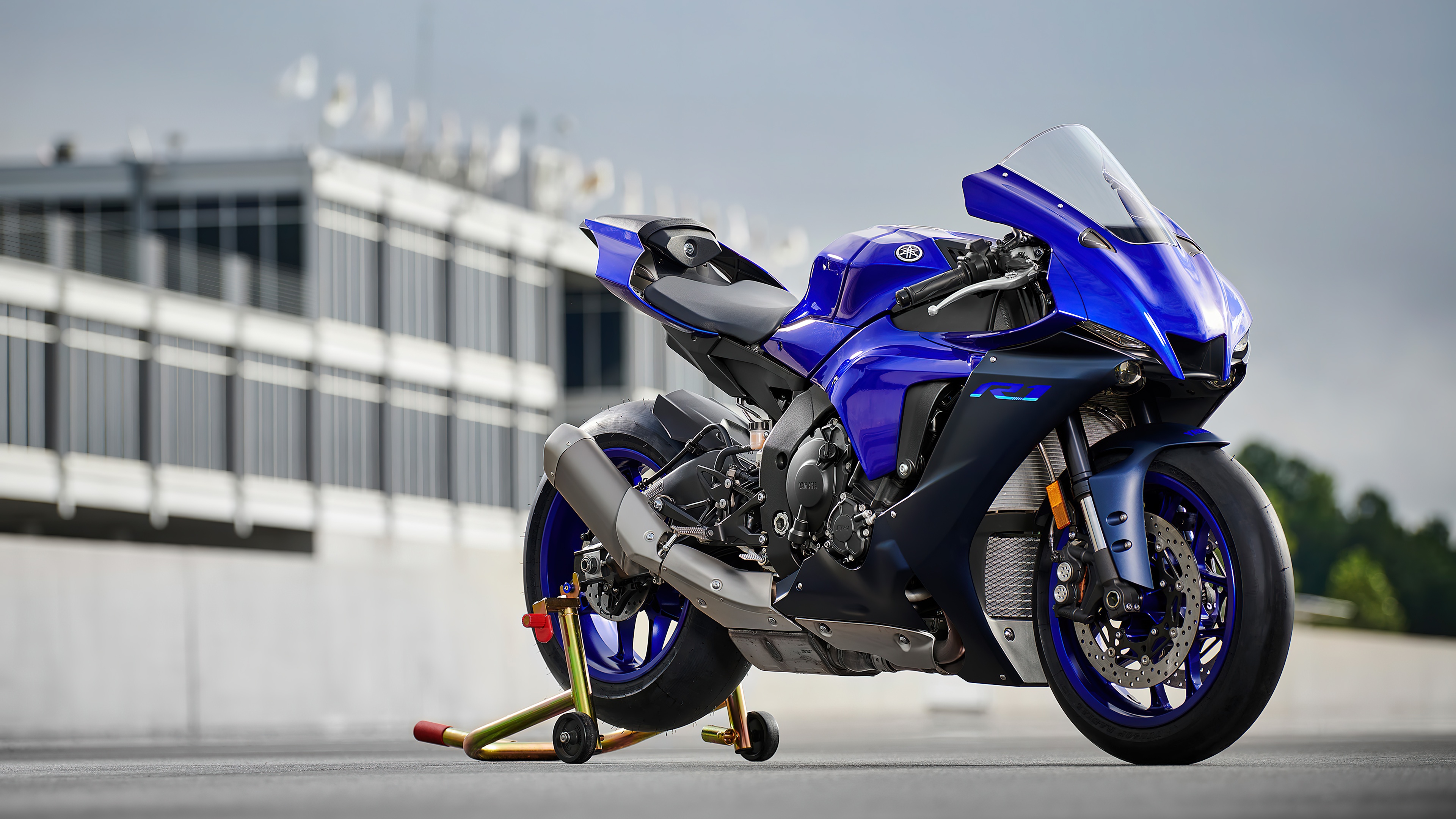 A sleek 2022 Yamaha YZF-R1 sports motorcycle displaying its aerodynamic design and racing aesthetics.