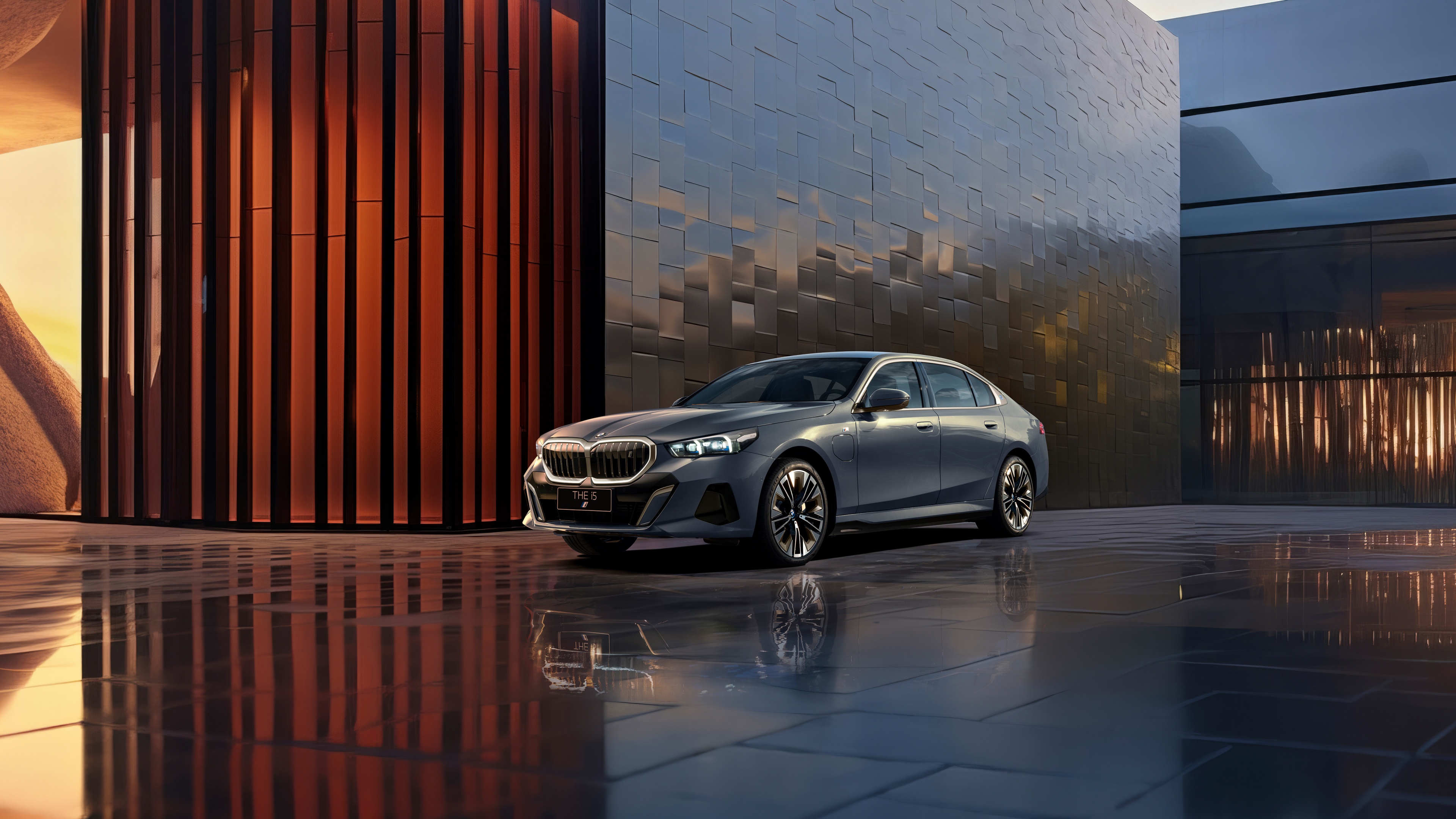 A high-resolution 5K shot of the 2024 BMW i5 electric sedan featuring its modern aerodynamic design.