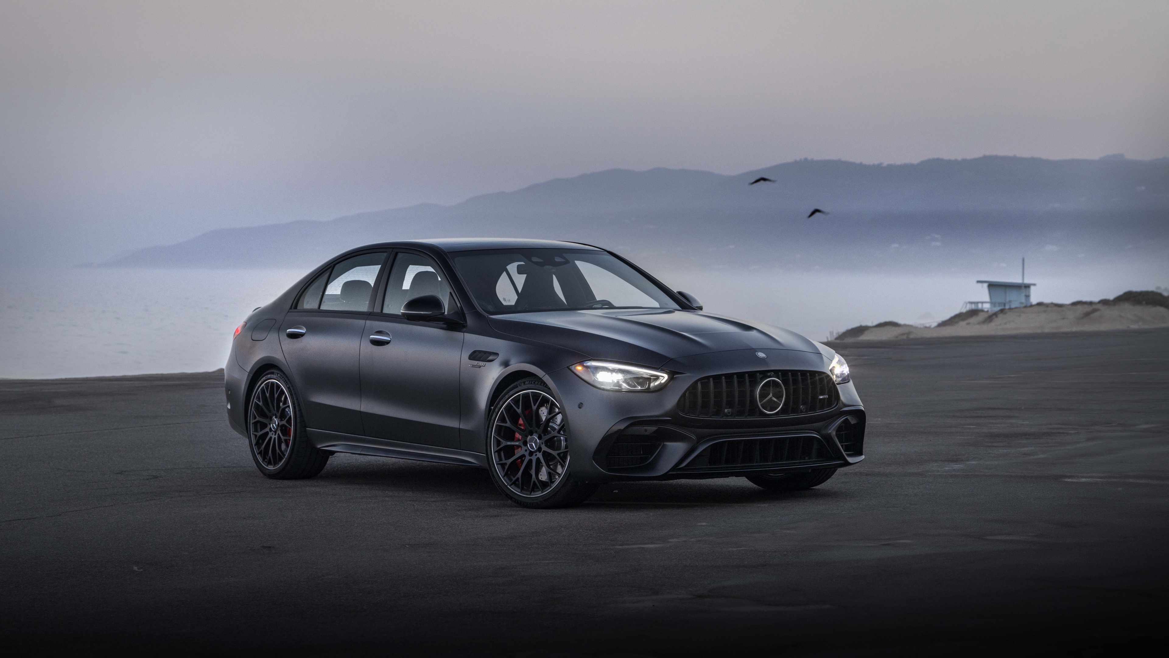 A detailed, high-definition view of the 2024 Mercedes-AMG C 63 S E Performance luxury sports sedan.
