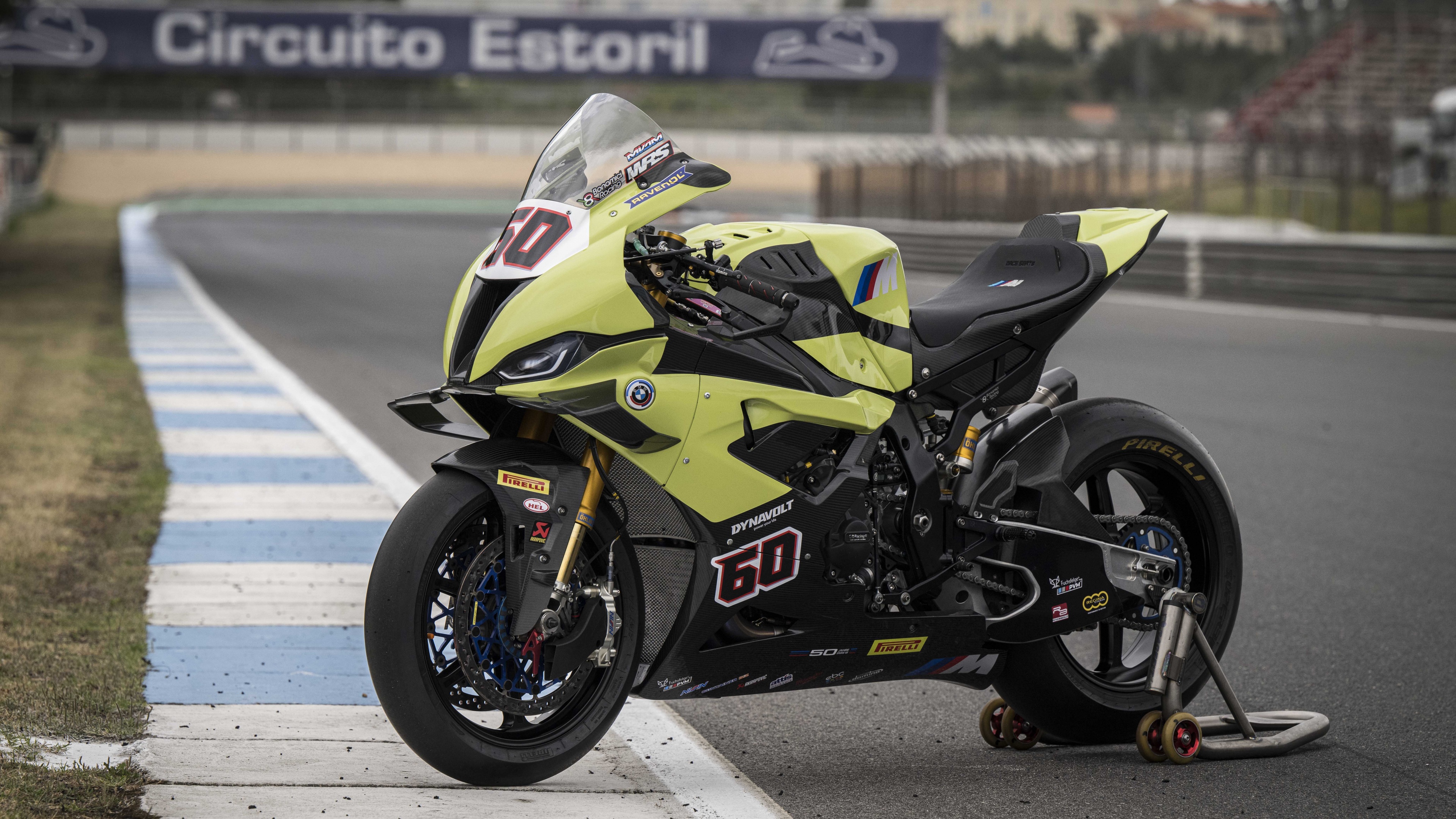 A high-resolution close-up of the BMW M 1000 RR 50 Years Anniversary Edition motorcycle featuring signature M racing colors.