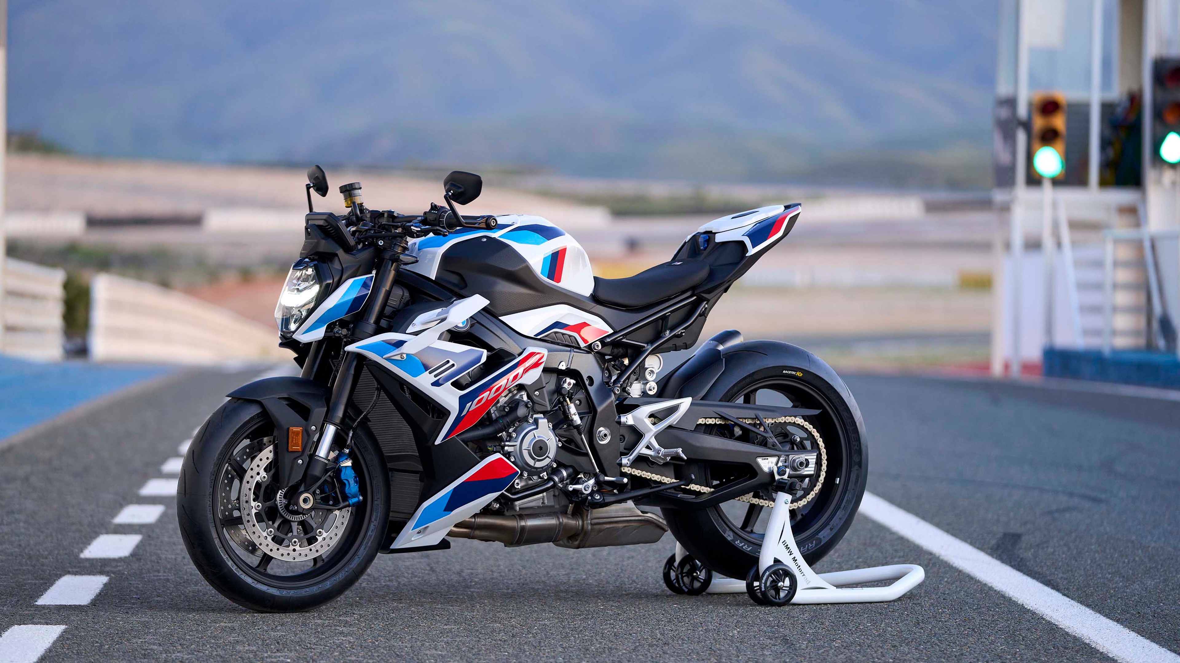 A detailed view of the 2023 BMW M 1000 R, a high-performance hyper roadster superbike.